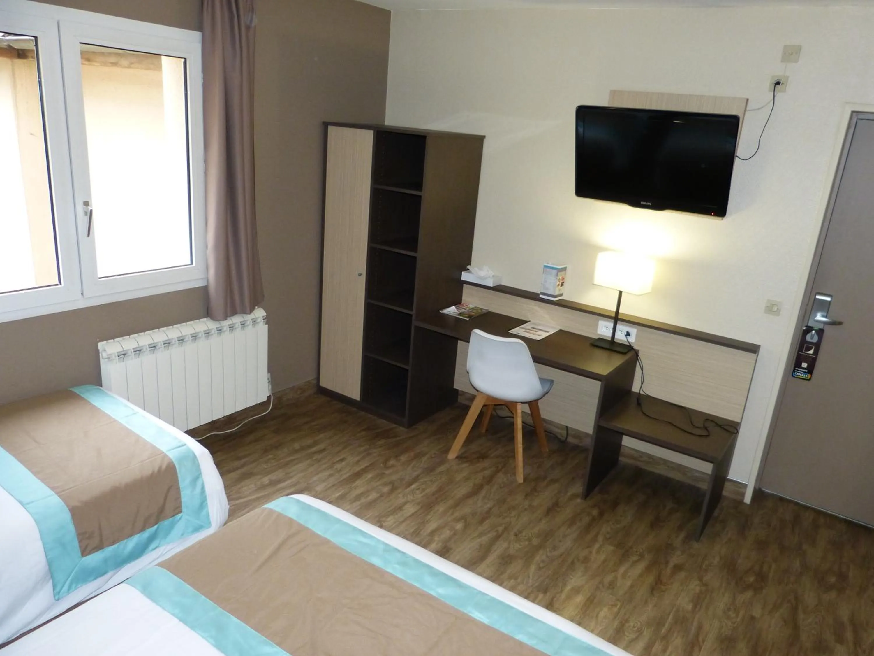 Seating area, Bed in Hotel ARBOR - Les Hunaudieres - Le Mans Sud - Mulsanne