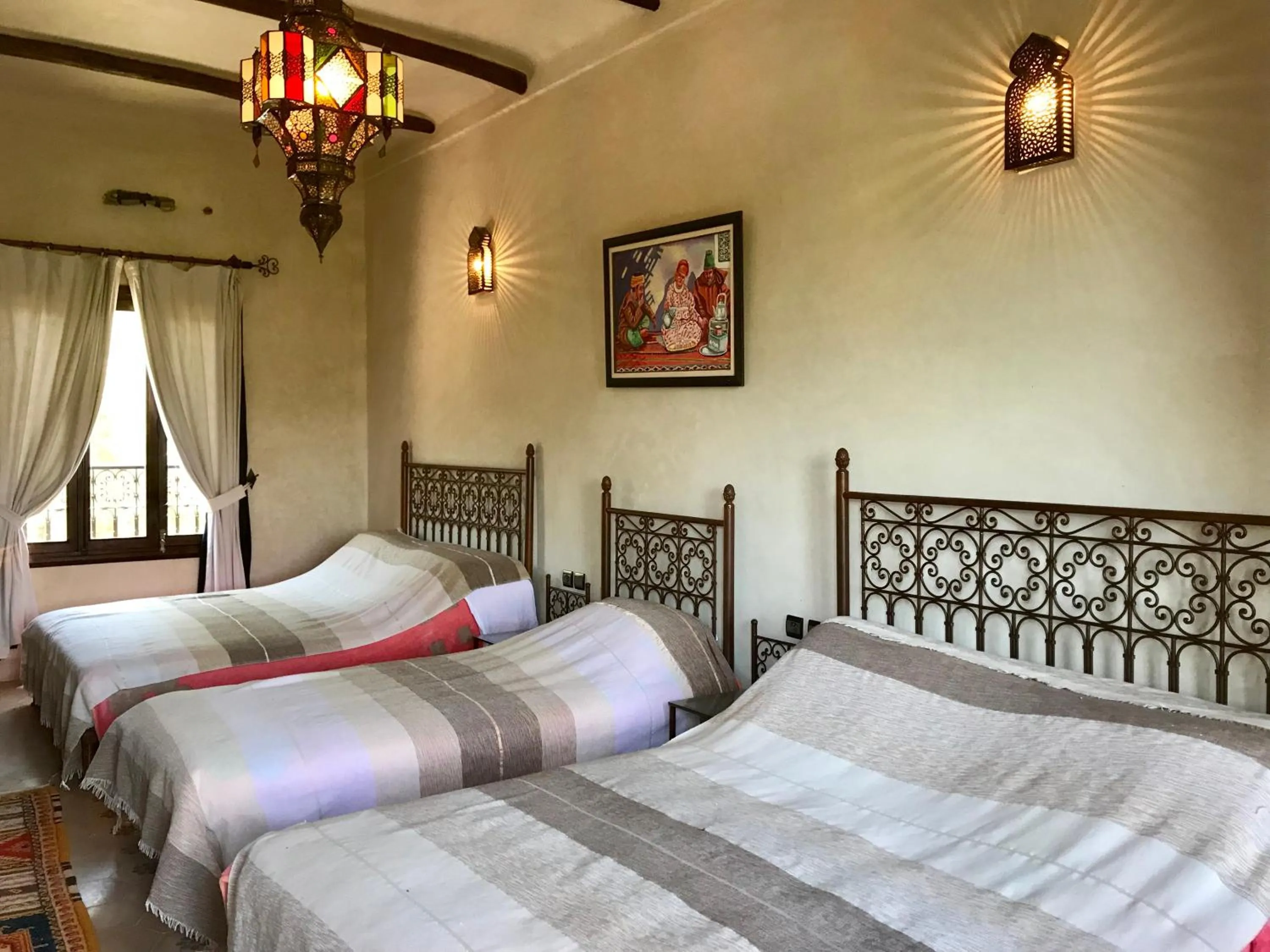 Bed in Auberge Chez Momo II