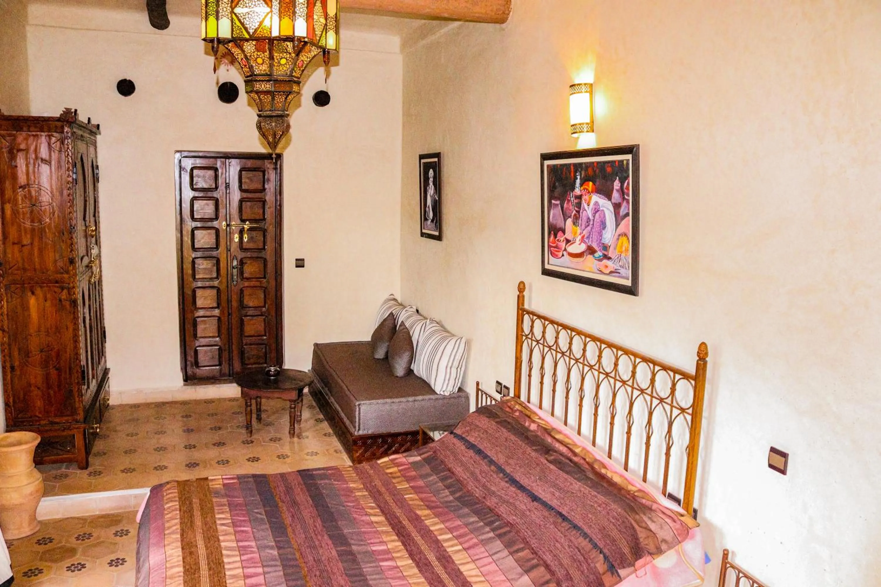 Bed in Auberge Chez Momo II