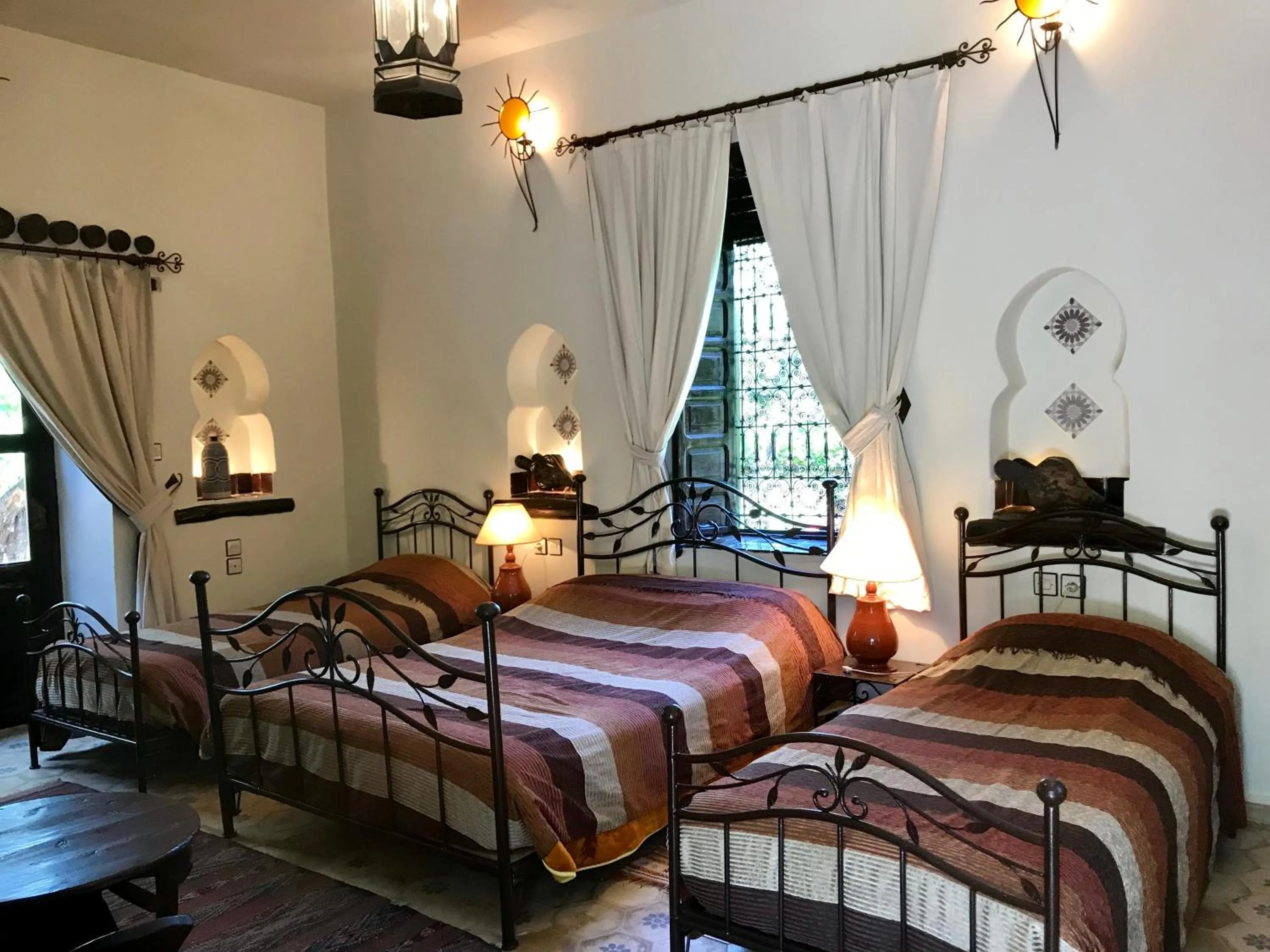 Bed in Auberge Chez Momo II