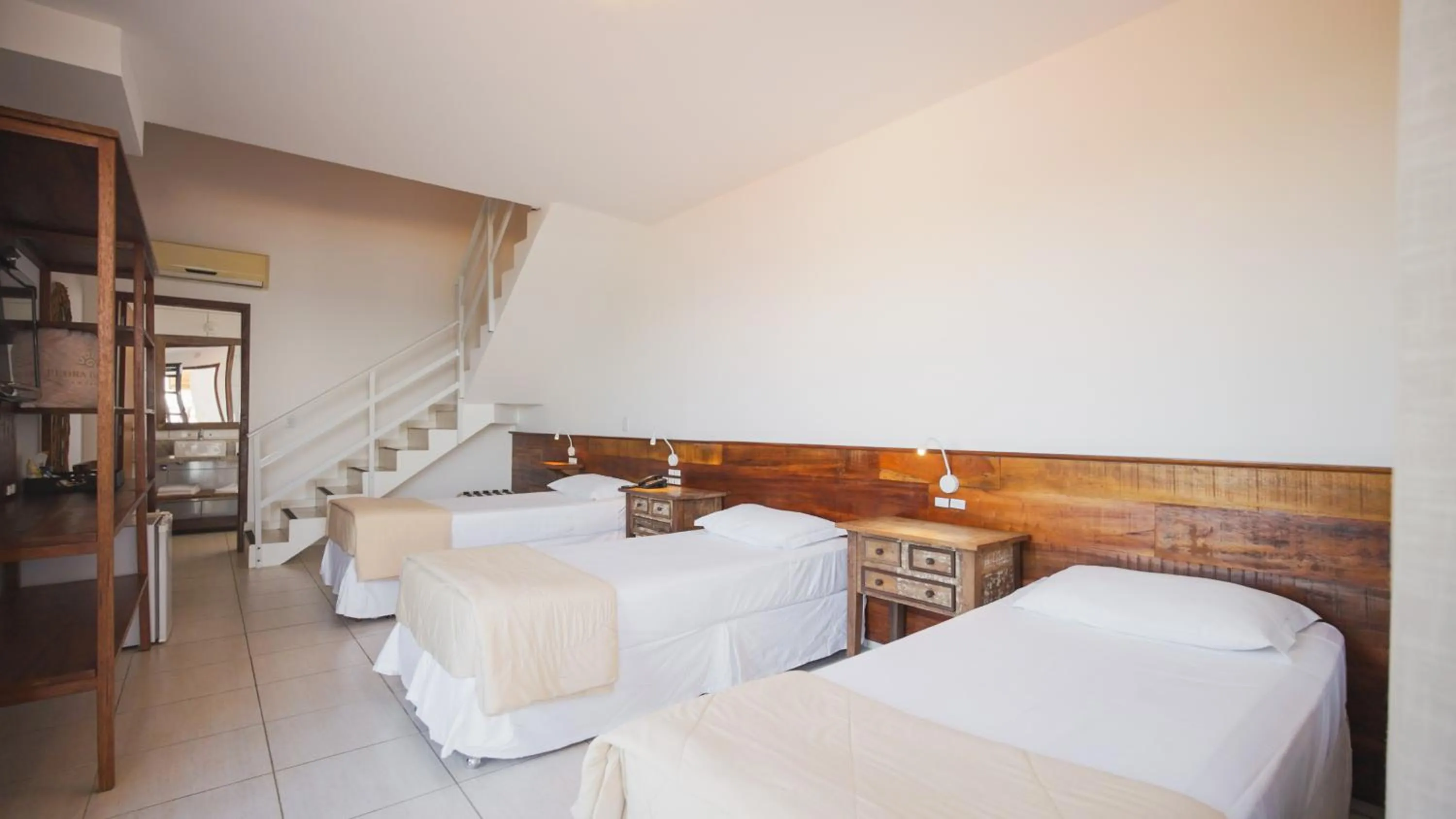 Bed in Pousada Pedra da Ilha