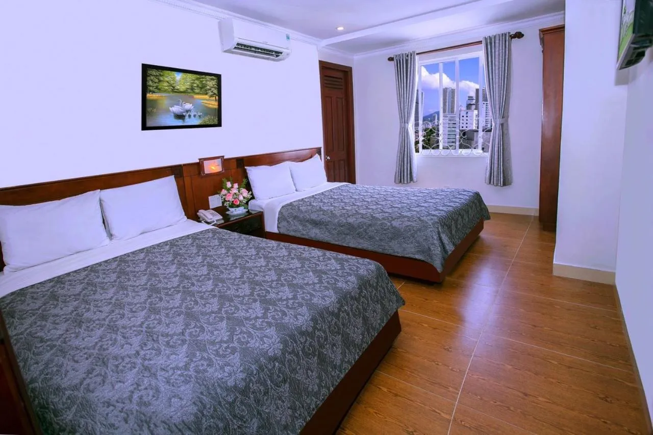 Bed in Nice Swan Hotel