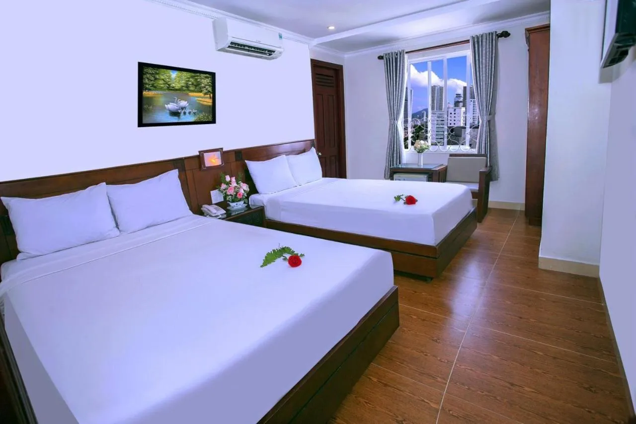 Bed in Nice Swan Hotel