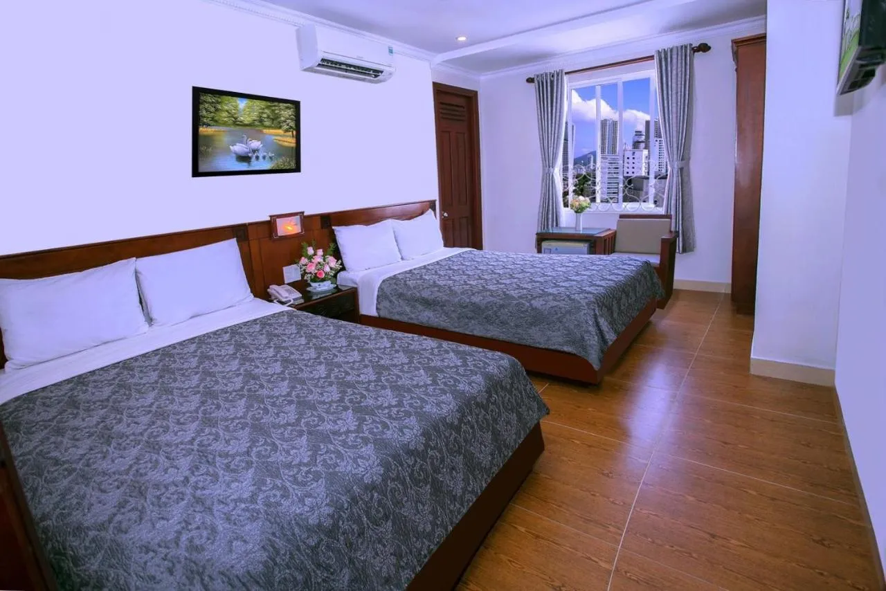 Bed in Nice Swan Hotel