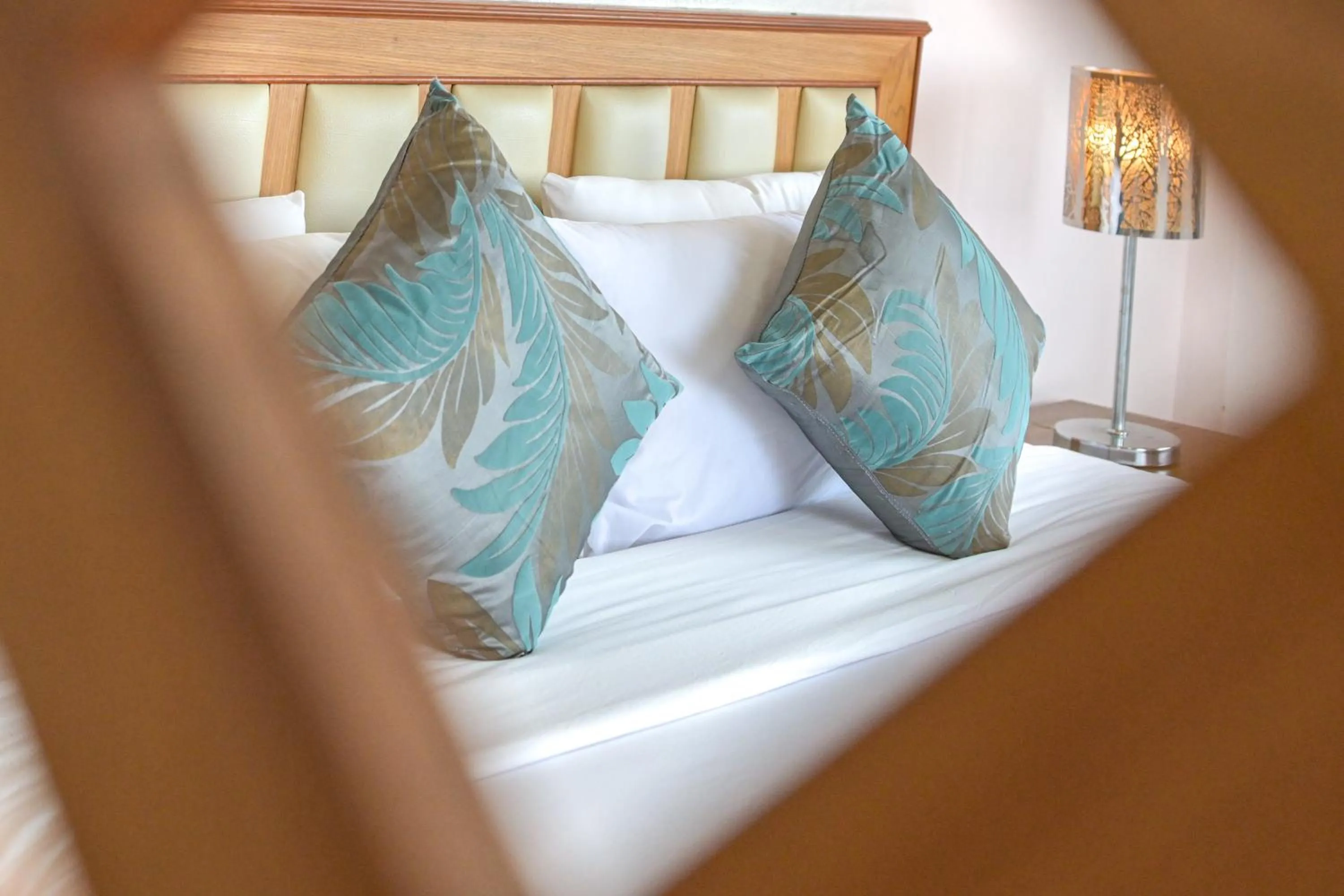 Bed in Rattana Park Hotel