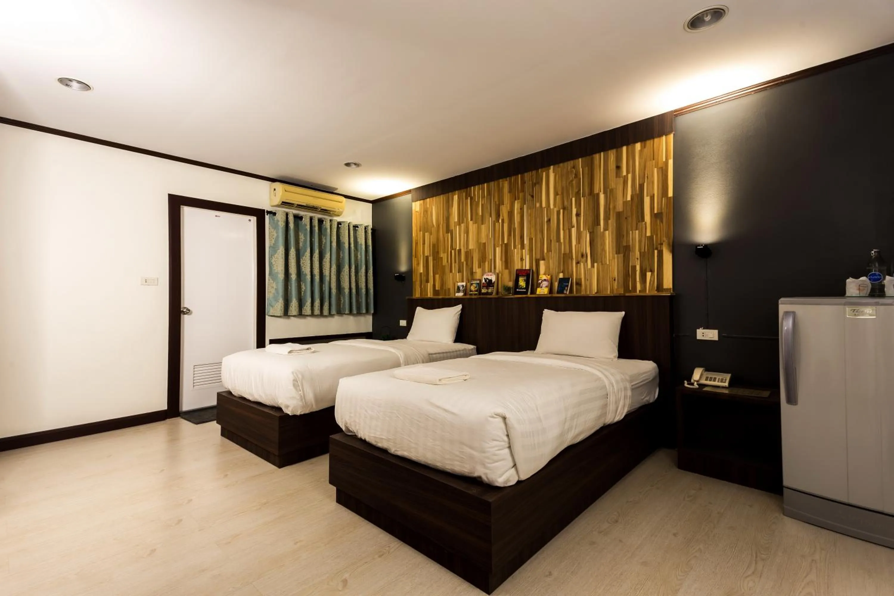 Bed in Phimai Paradise Boutique Hotel