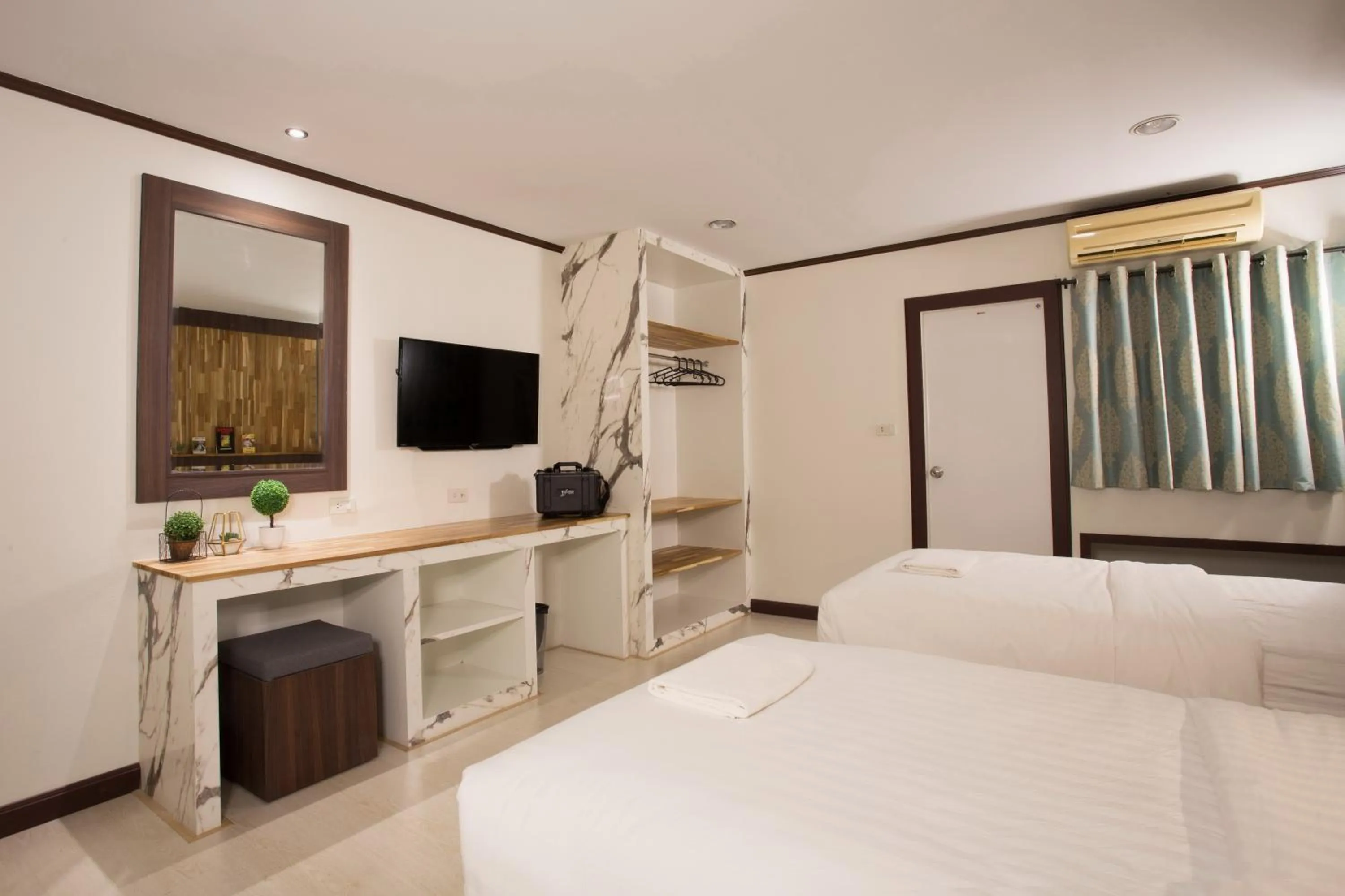 Bed in Phimai Paradise Boutique Hotel
