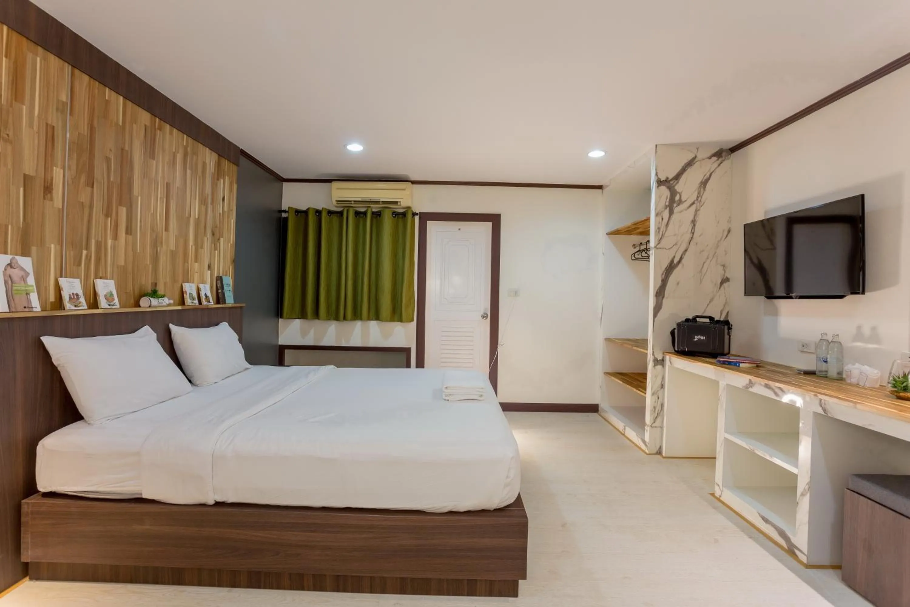 Bed in Phimai Paradise Boutique Hotel