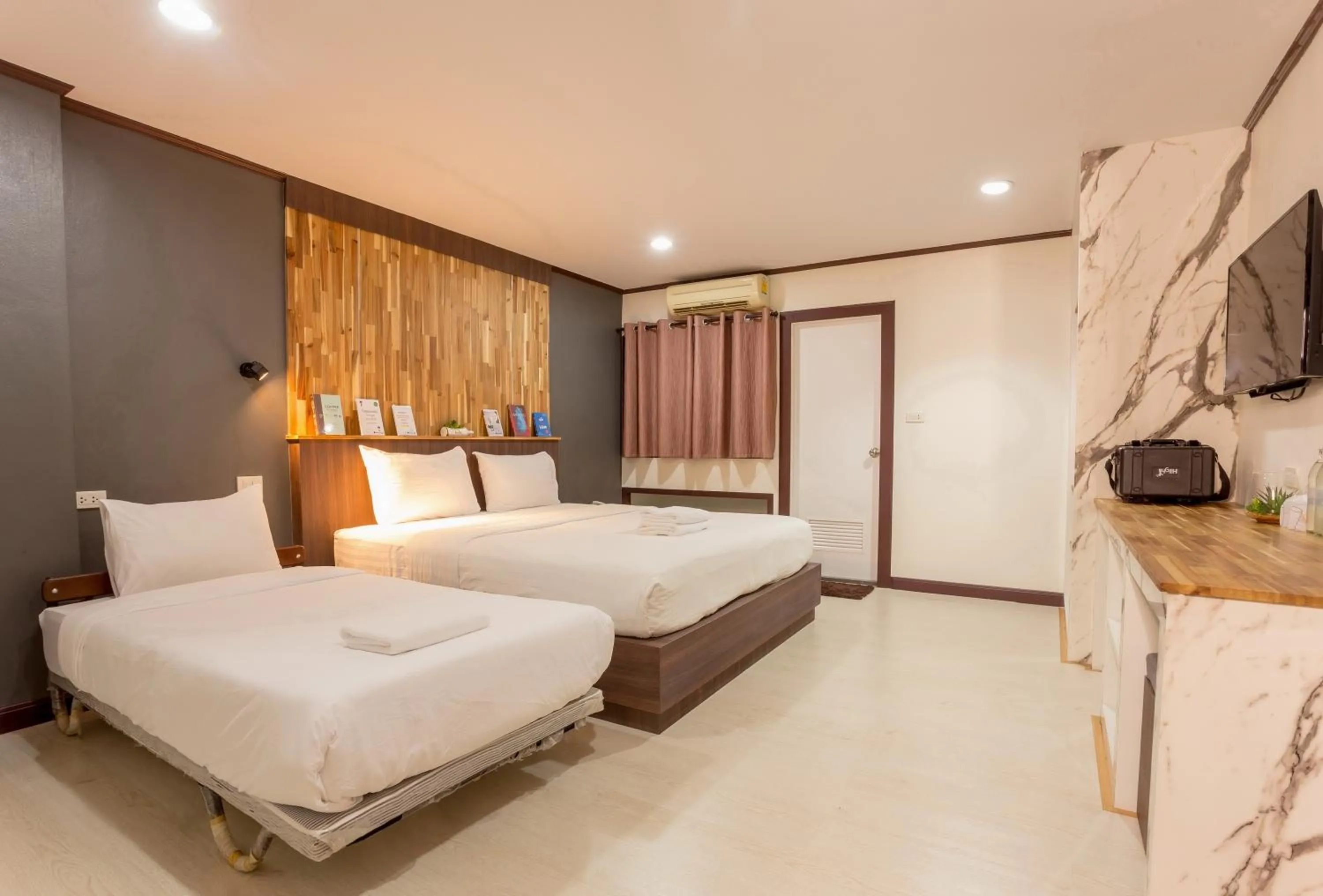 Bed in Phimai Paradise Boutique Hotel