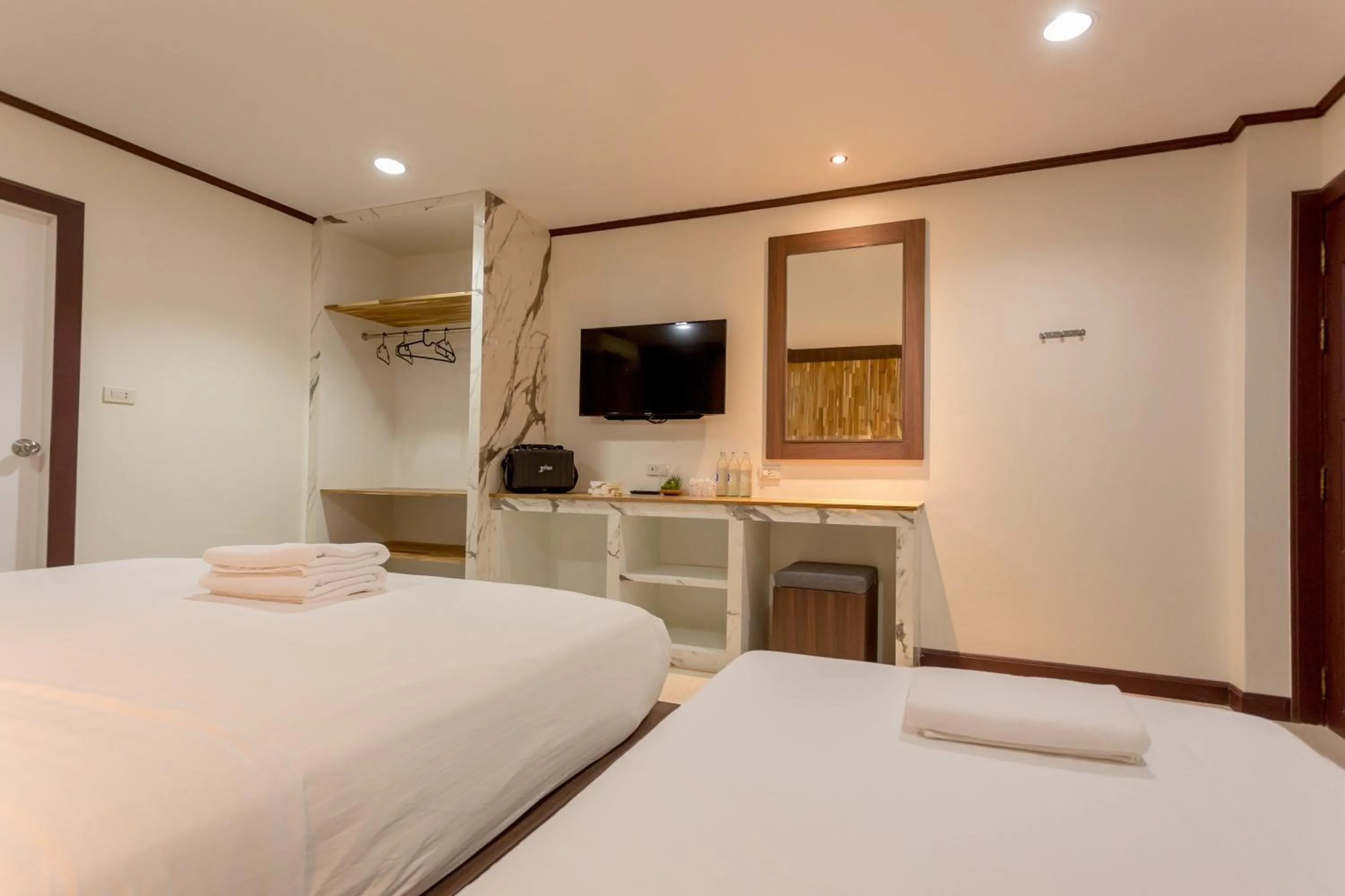 Bed in Phimai Paradise Boutique Hotel