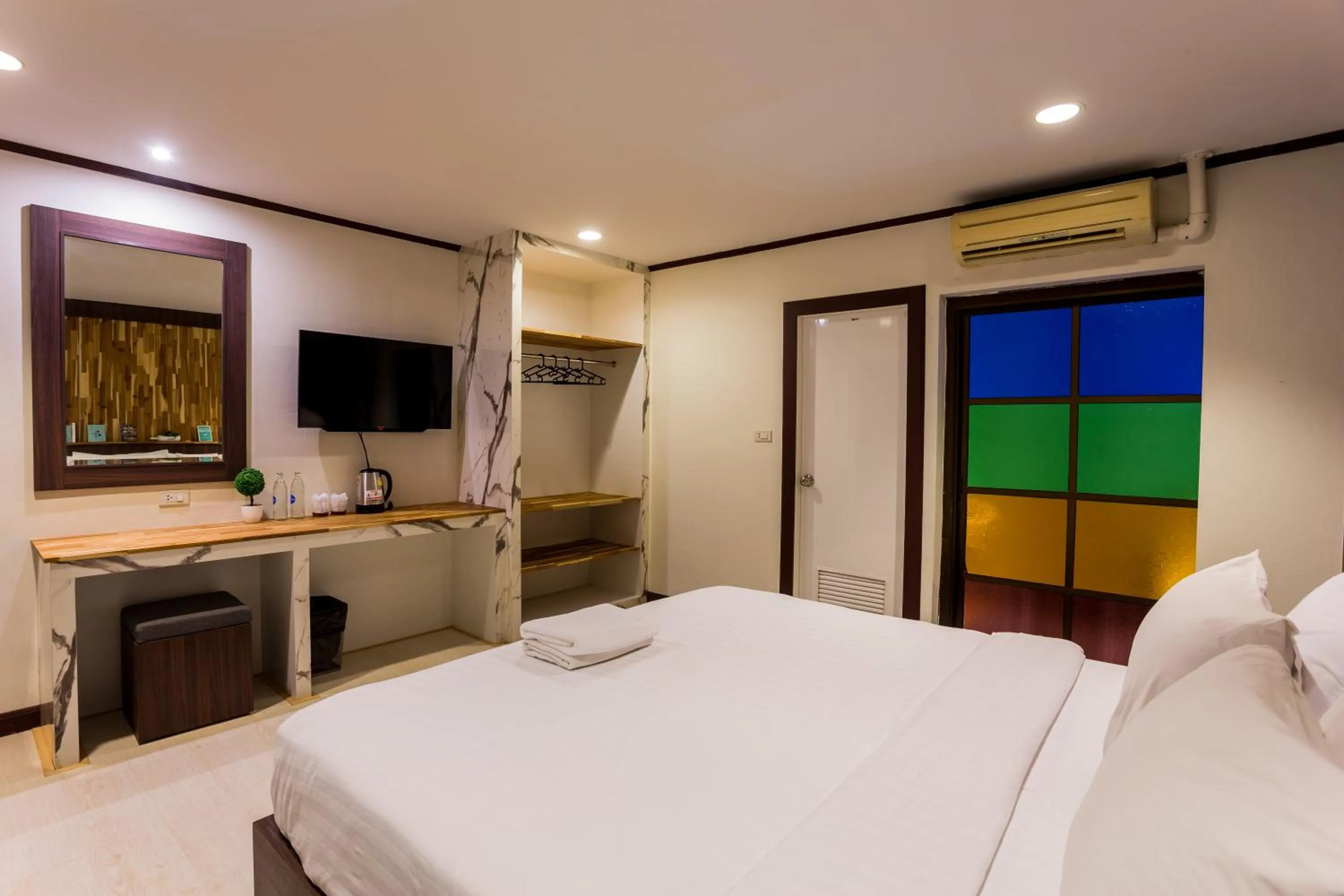 Bed in Phimai Paradise Boutique Hotel