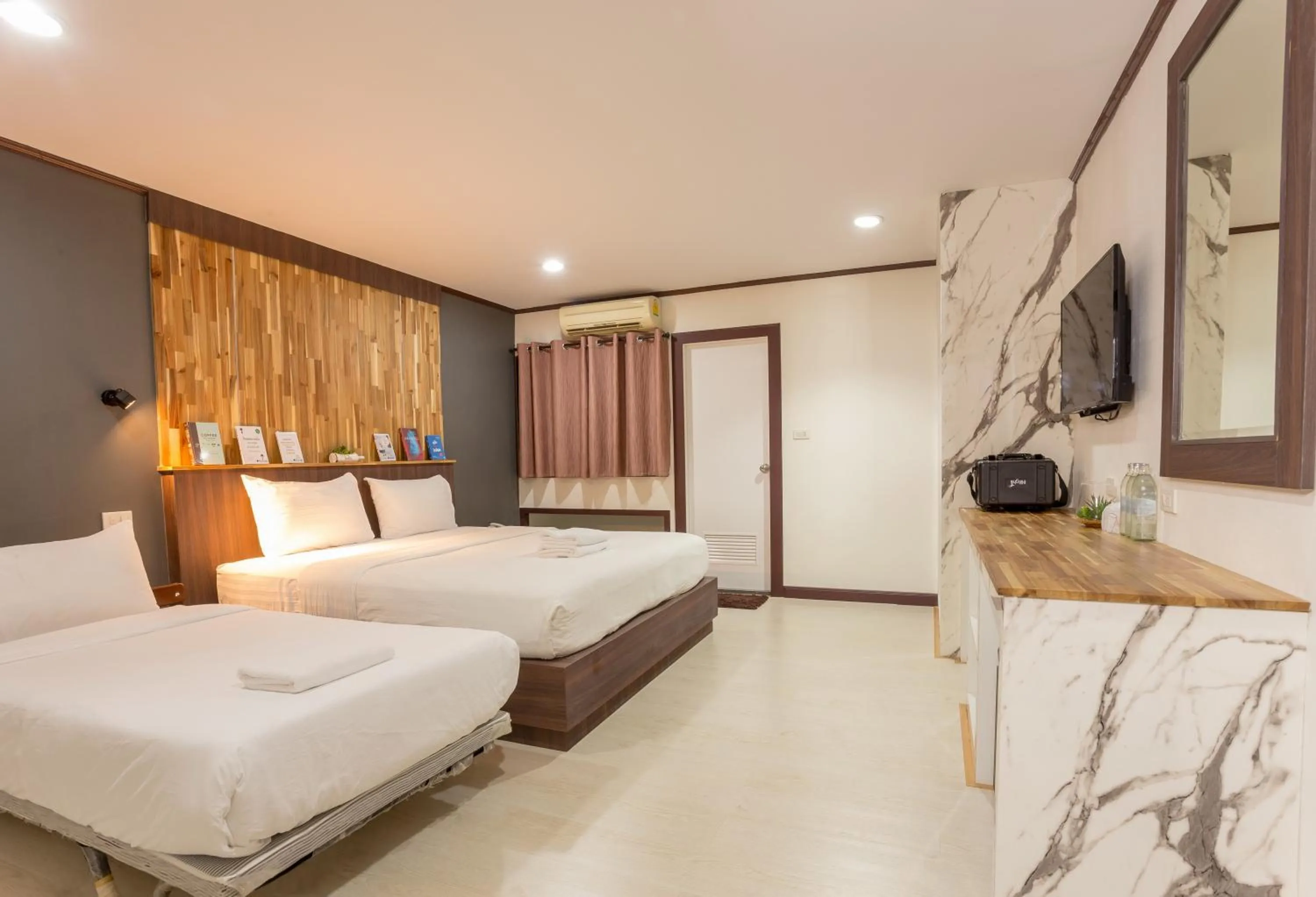 Bed in Phimai Paradise Boutique Hotel