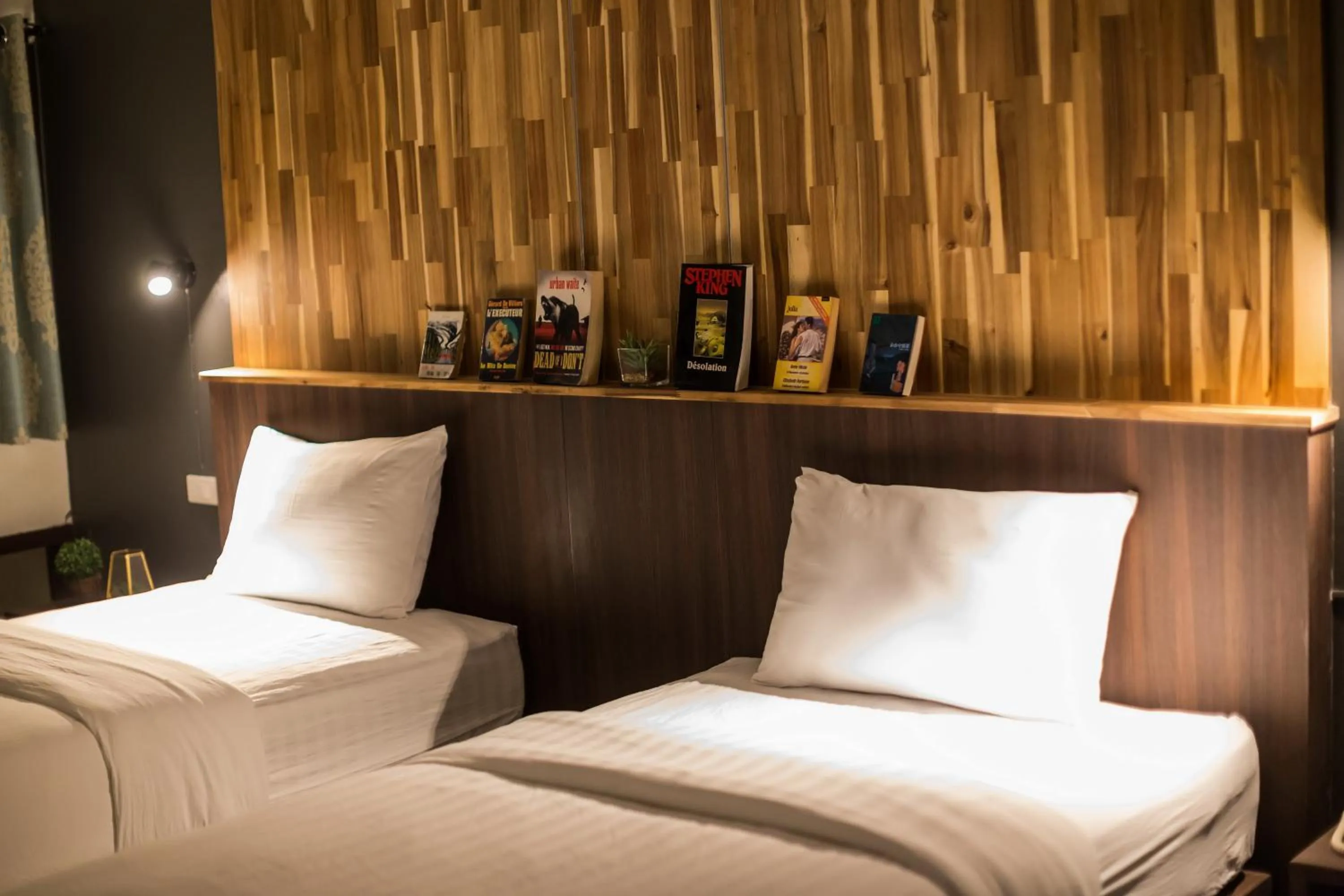 Bed in Phimai Paradise Boutique Hotel