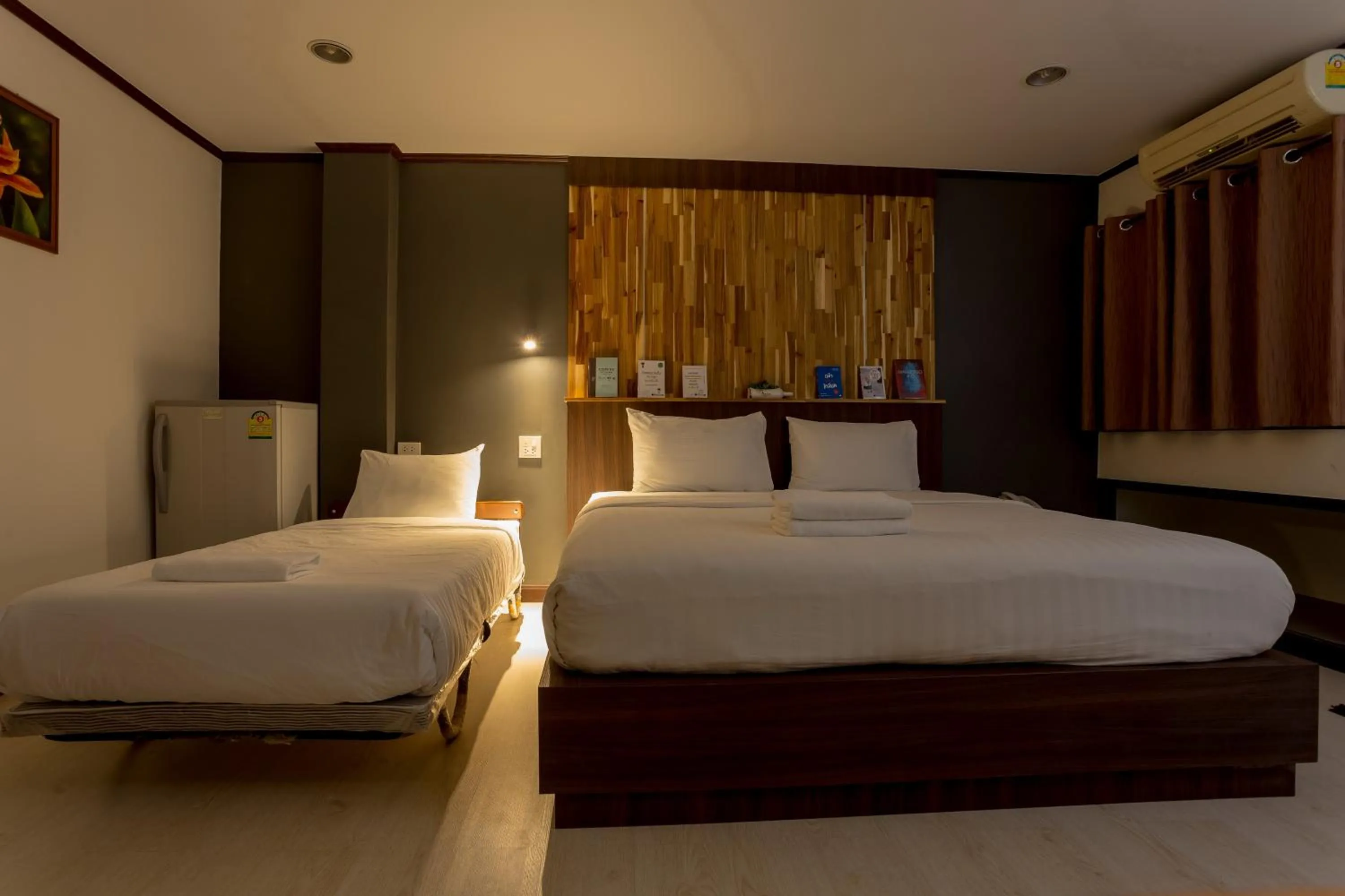 Bed in Phimai Paradise Boutique Hotel