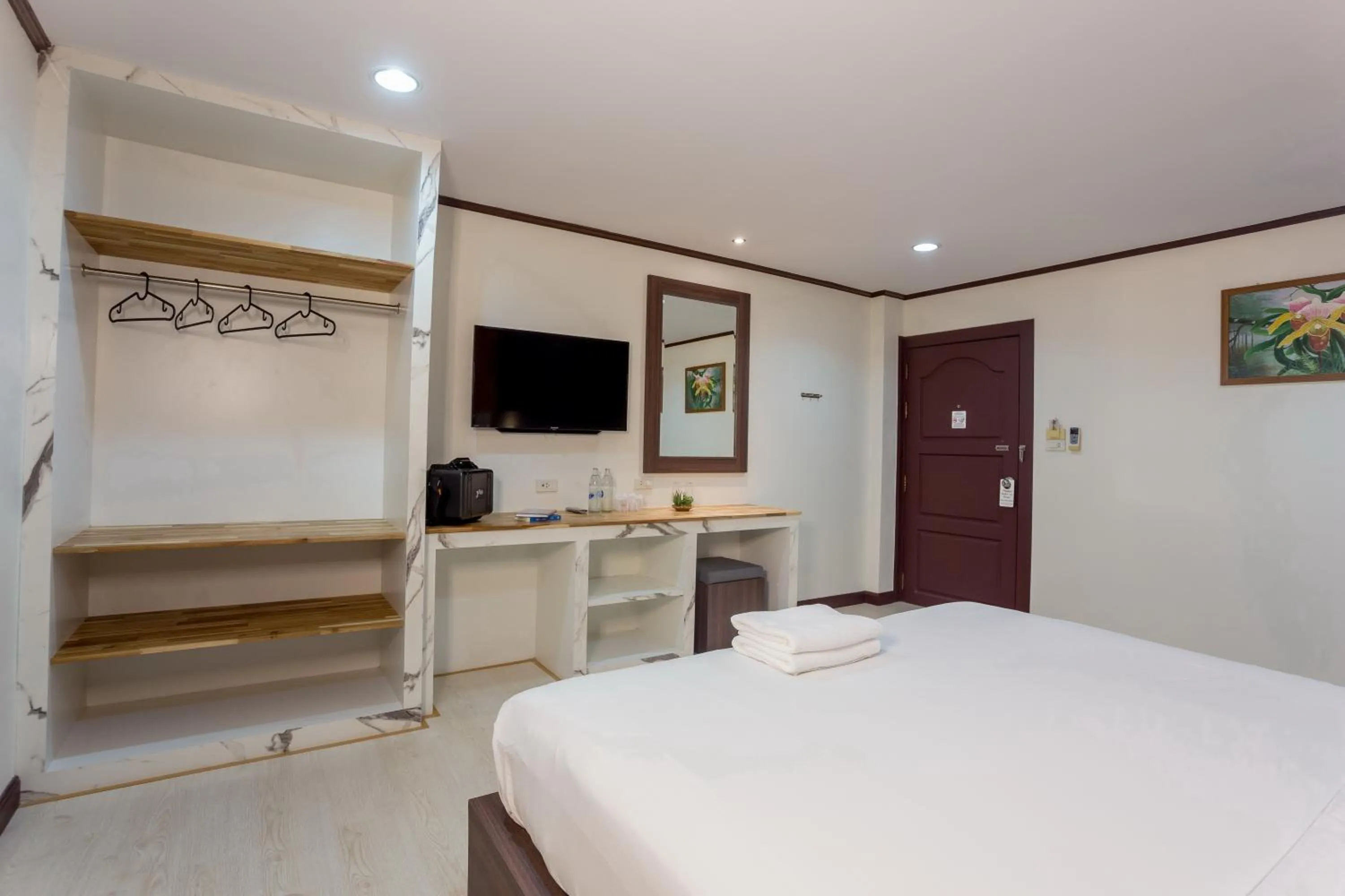 Bed in Phimai Paradise Boutique Hotel