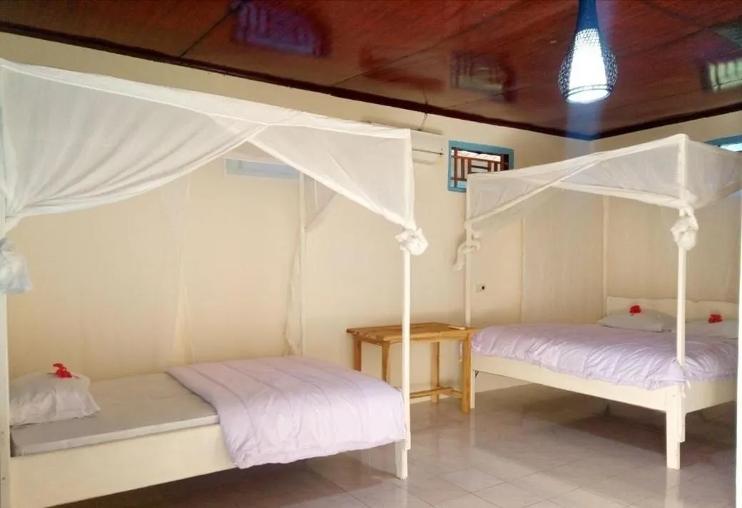 Bed in Lakey Beach Inn hotel