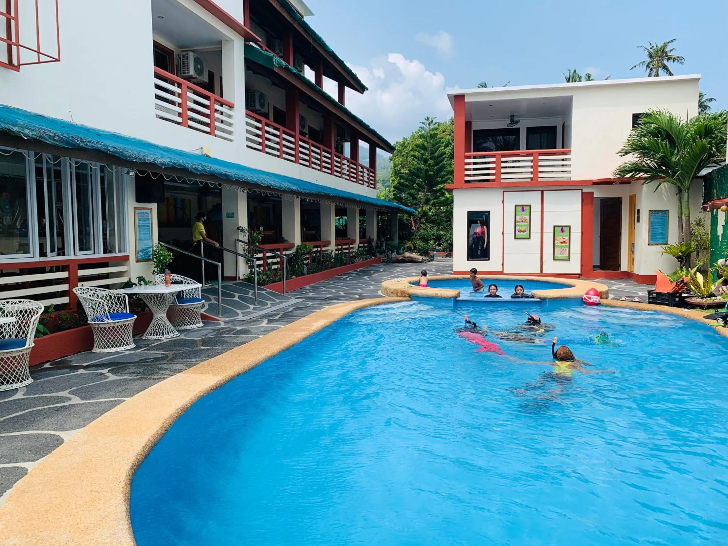 Swimming pool in Badladz Beach and Dive Resort