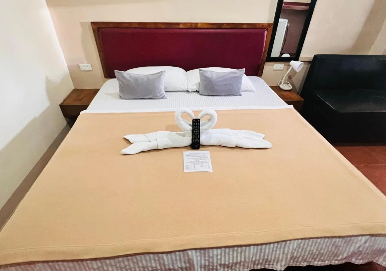 Bed in Badladz Beach and Dive Resort