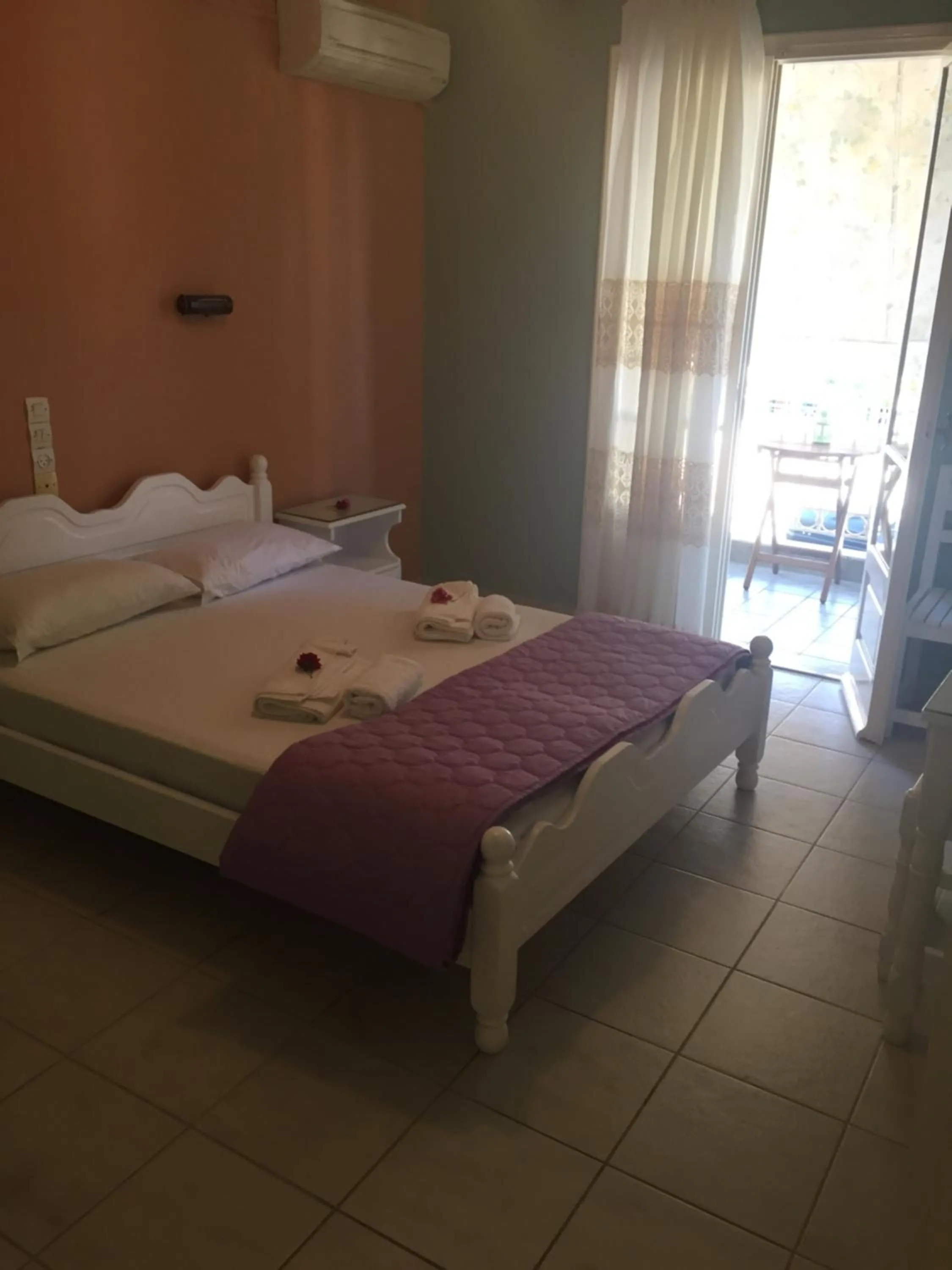 Bed in Georgakis George Rooms