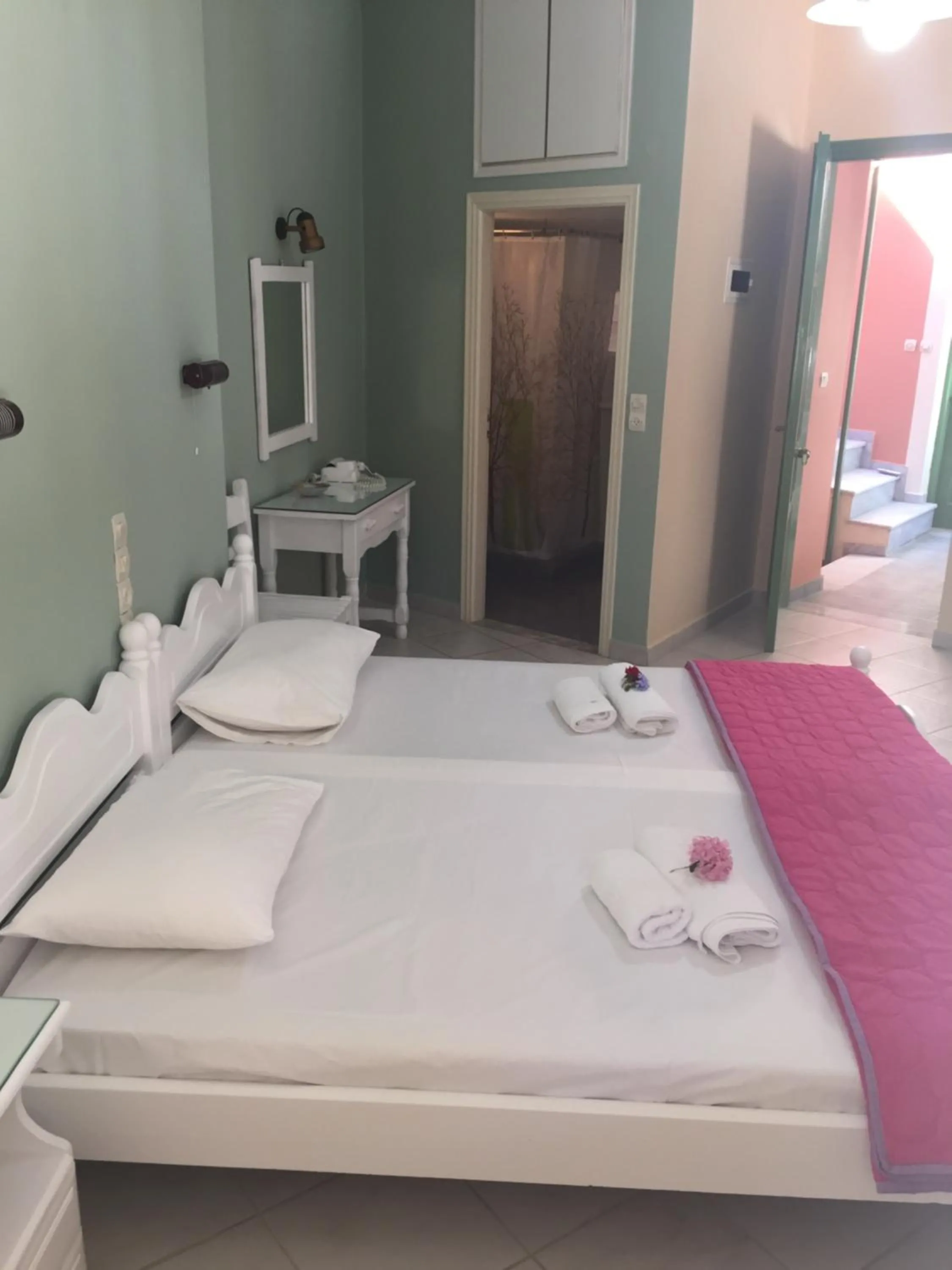 Bed in Georgakis George Rooms