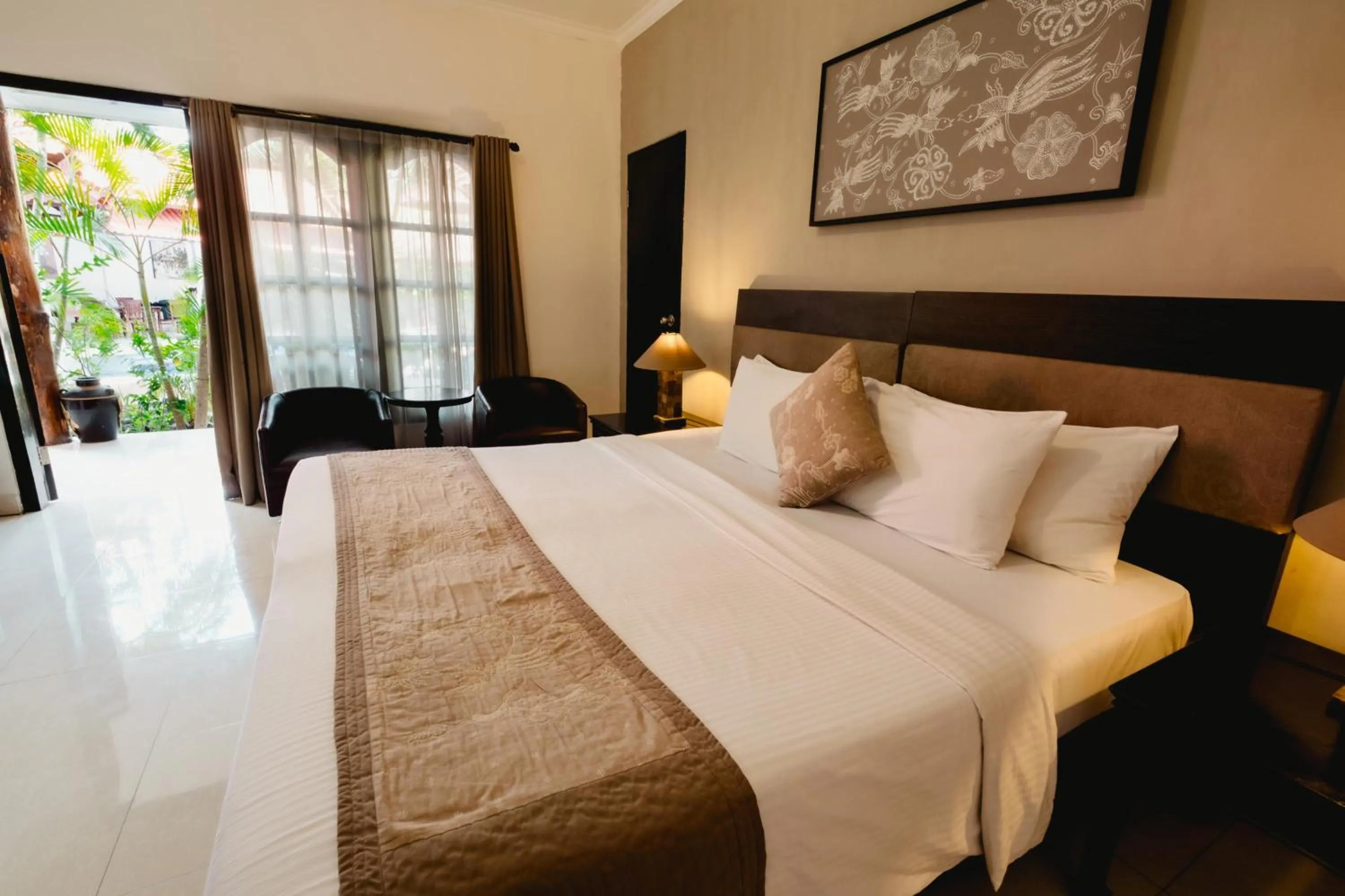 Bed in Sarinande Hotel