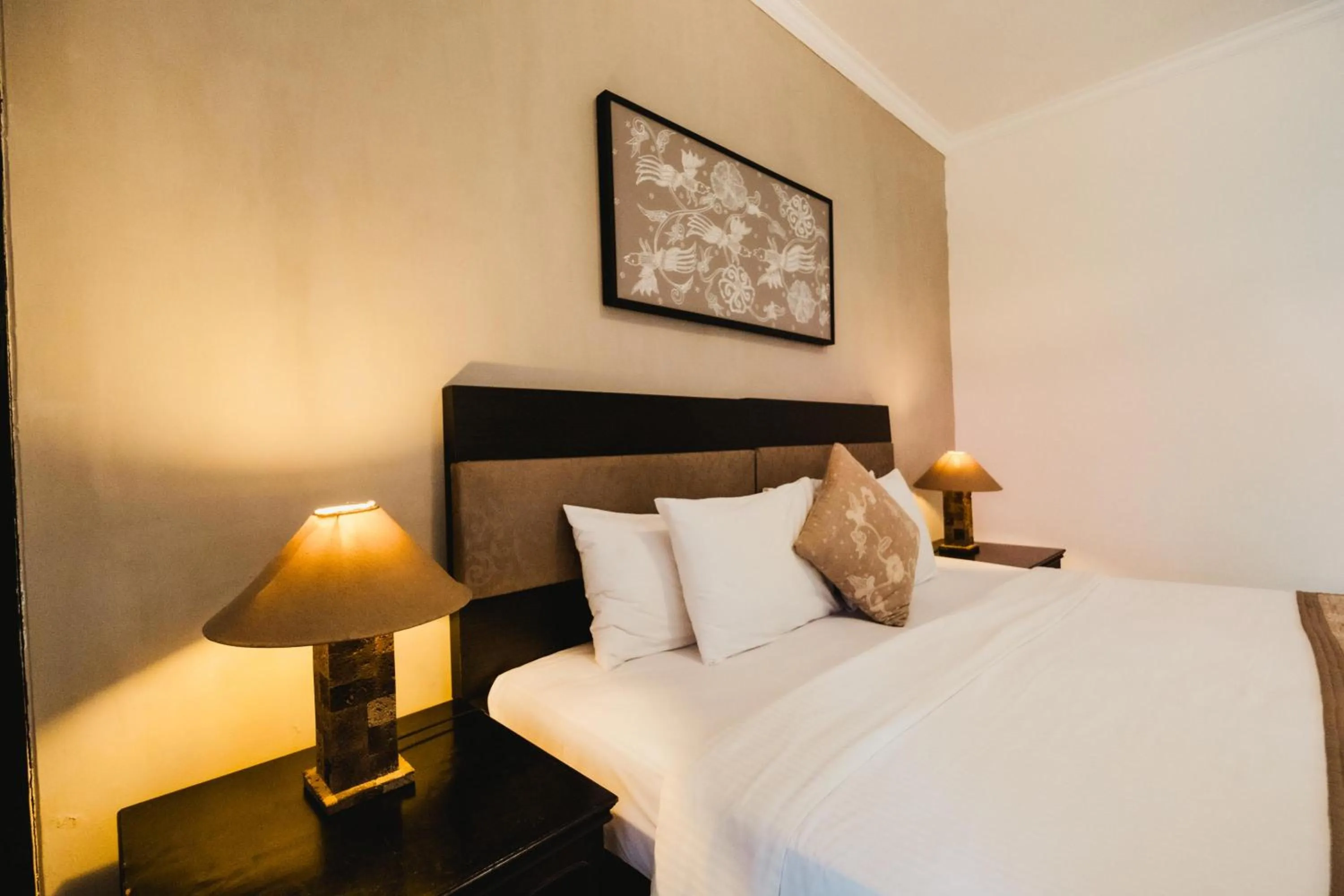 Bed in Sarinande Hotel