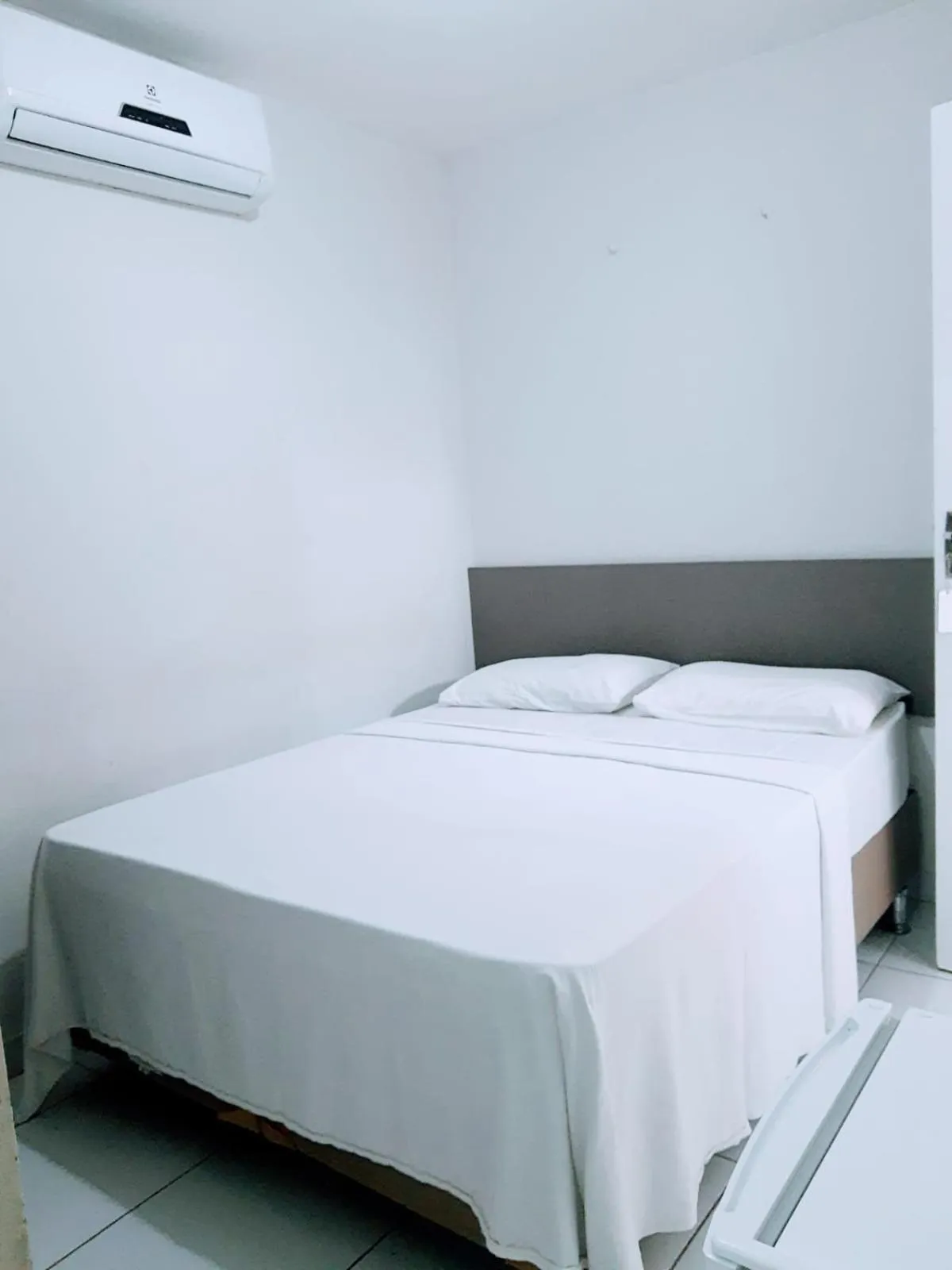 Bed in Pousada Tambaú