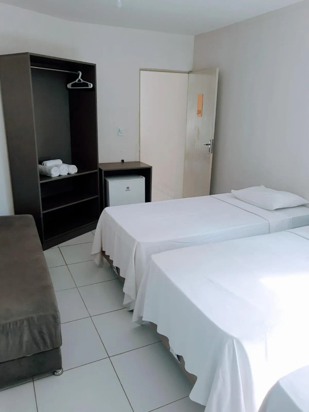 Bed in Pousada Tambaú