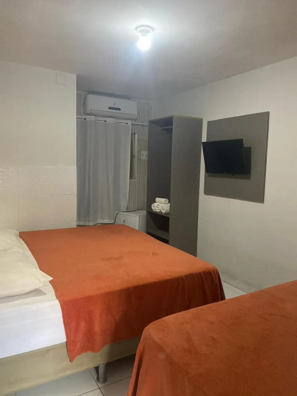 Bed in Pousada Tambaú