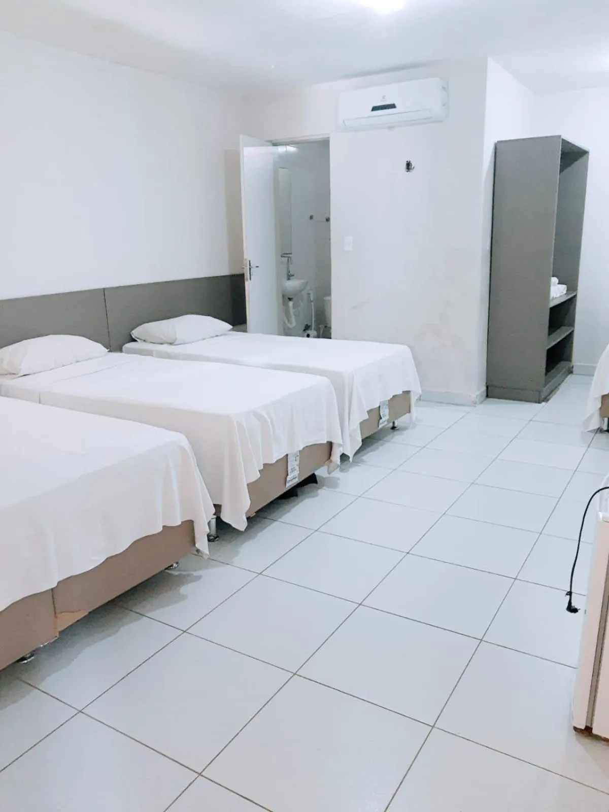 Bed in Pousada Tambaú