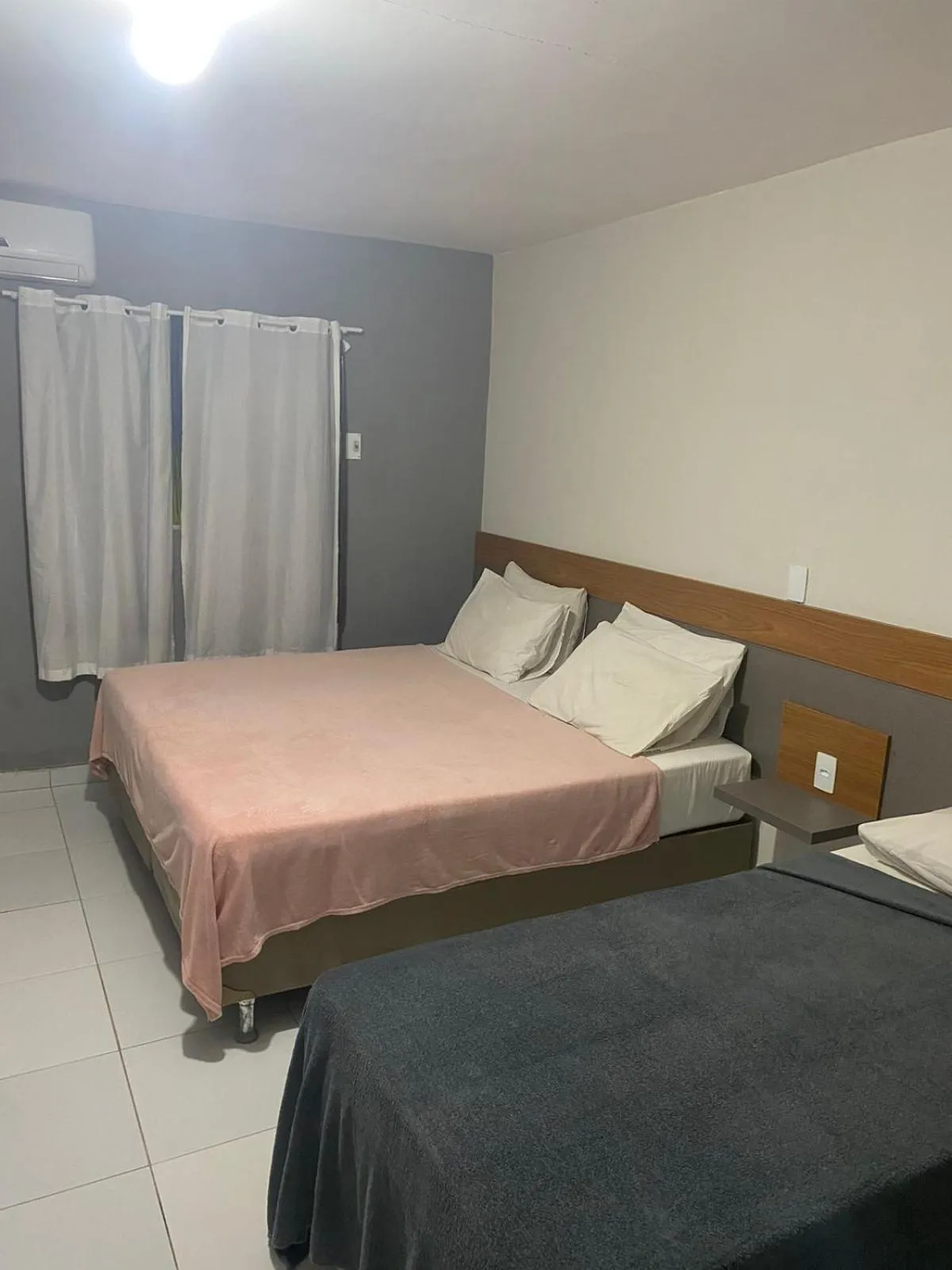 Bed in Pousada Tambaú