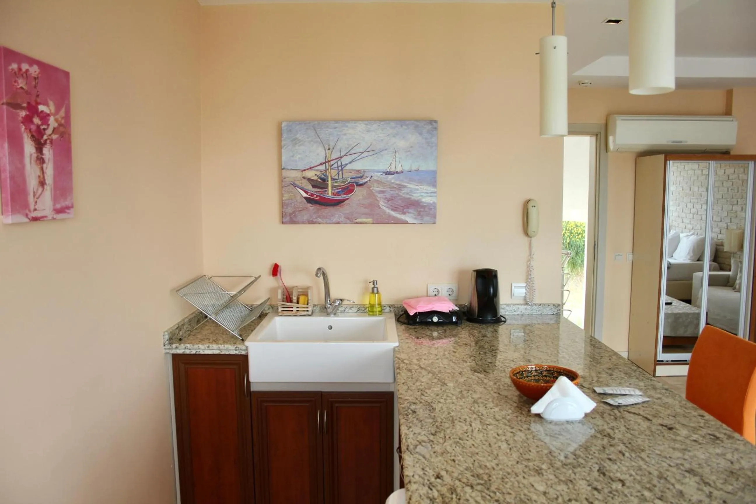 Kitchen or kitchenette in Saylam Suites