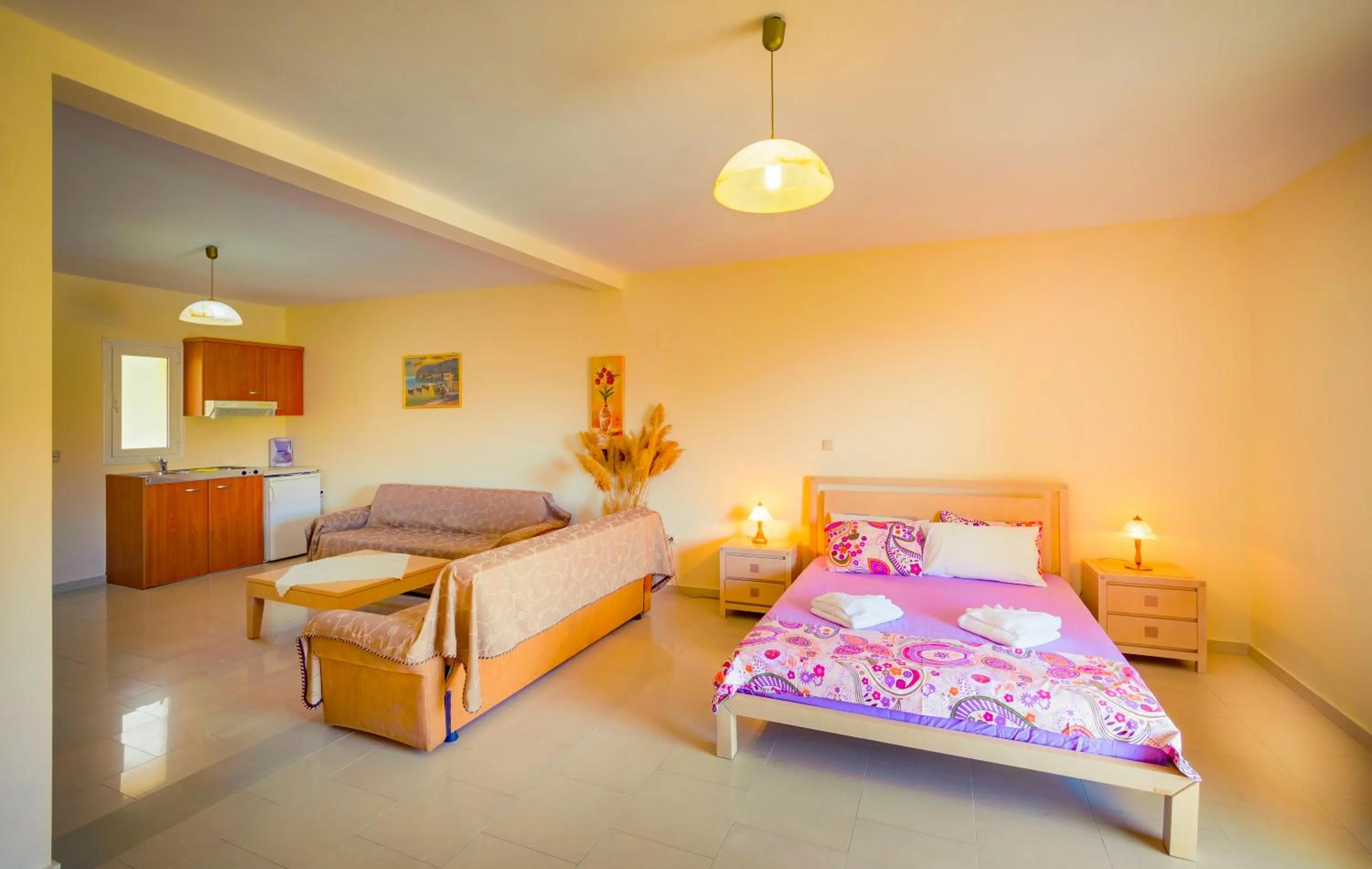 Bed in Limnionas Bay Village Hotel