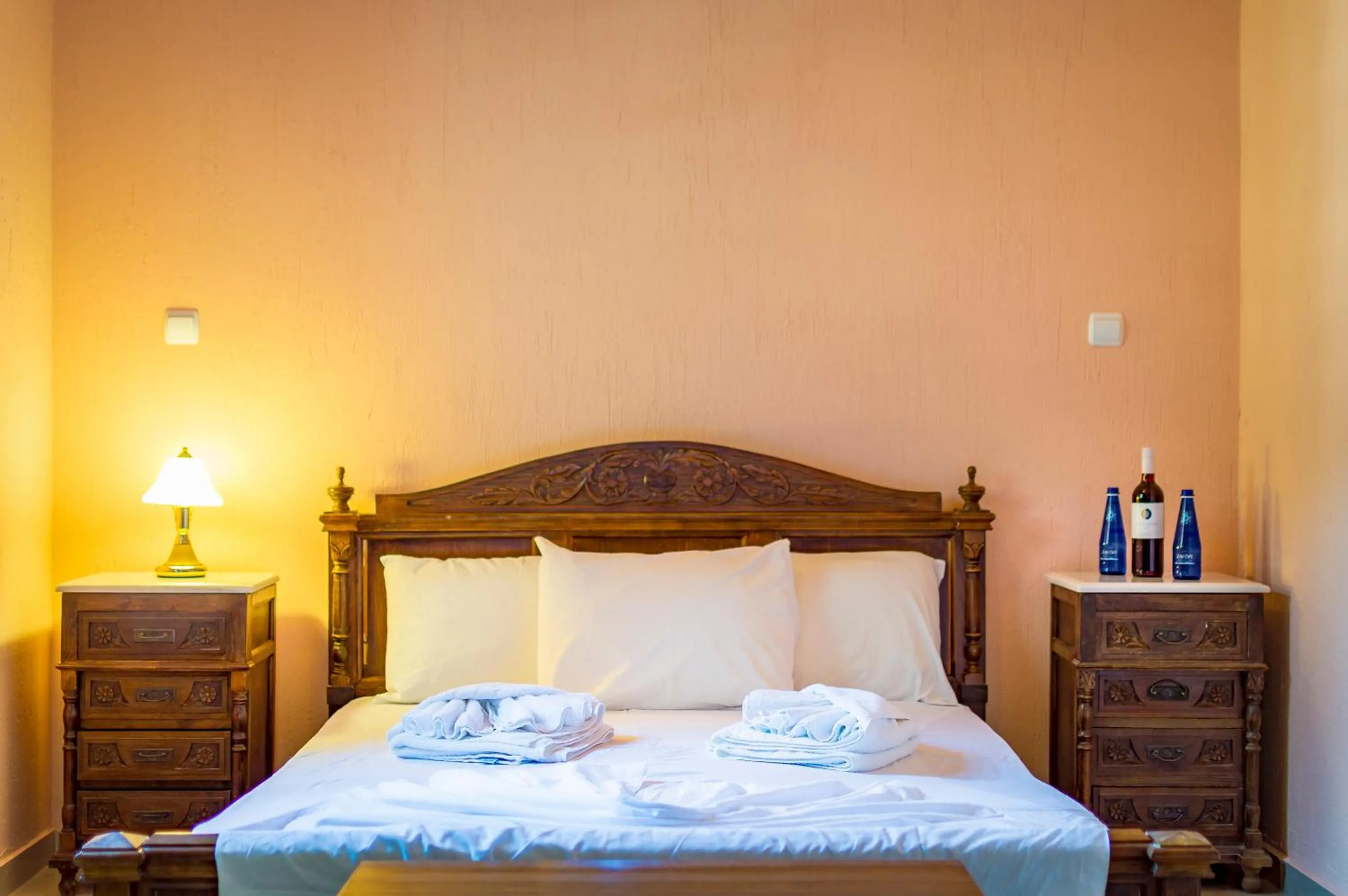 Bed in Limnionas Bay Village Hotel