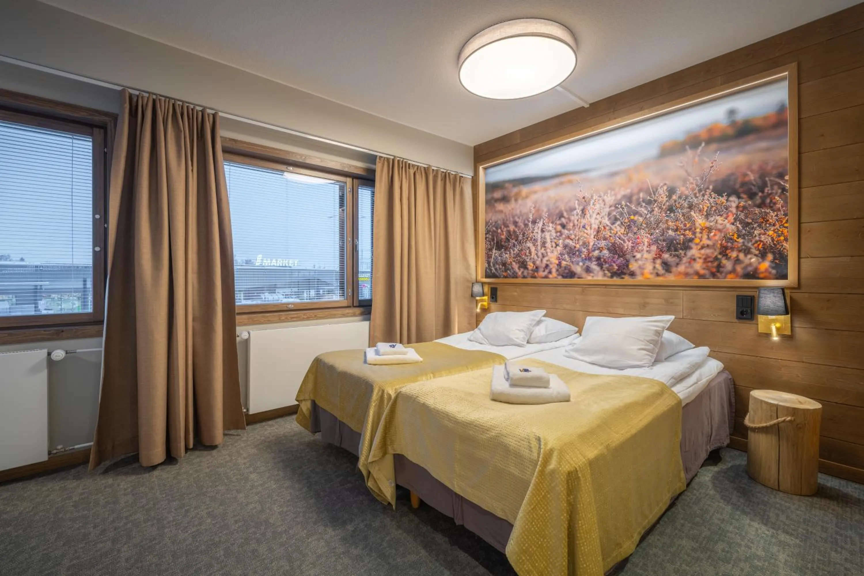 Bed in Kultahippu Hotel & Apartments