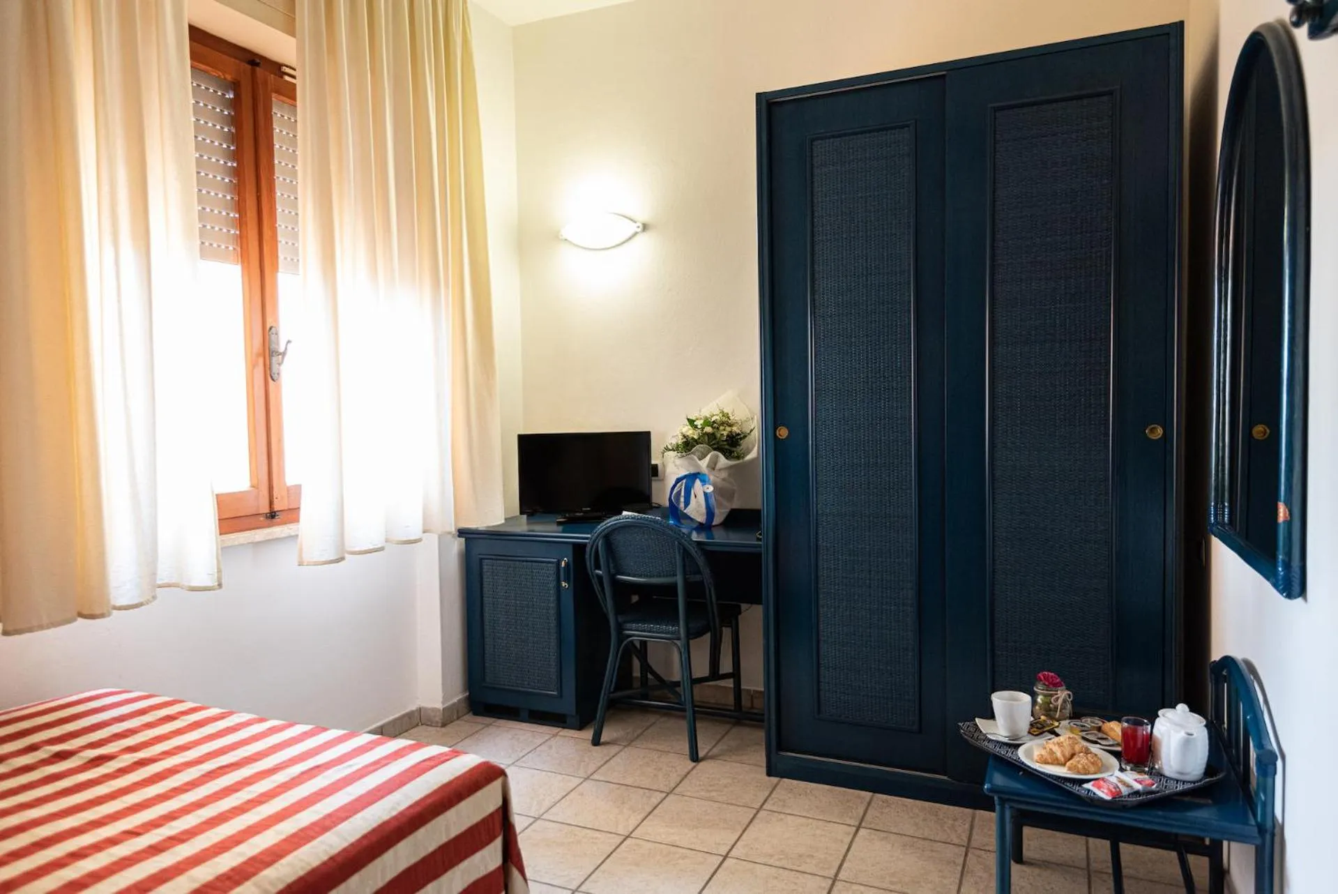 Bed in Hotel il Delfino