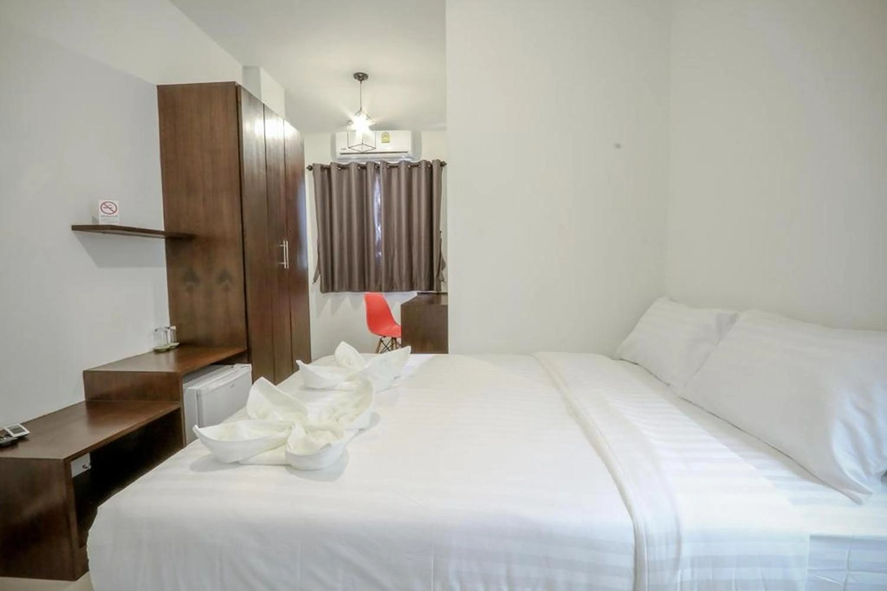 Bed in Hotel Wualai by CMStay