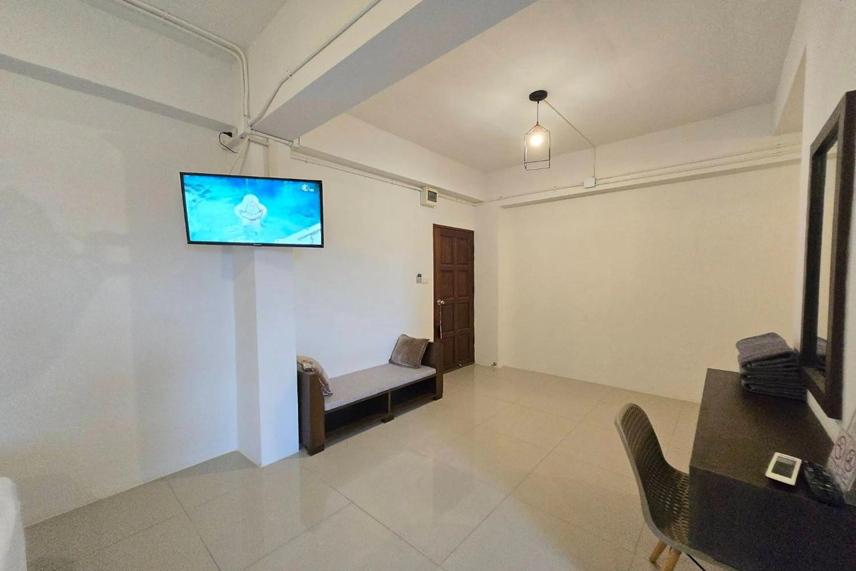 TV and multimedia in Hotel Wualai by CMStay