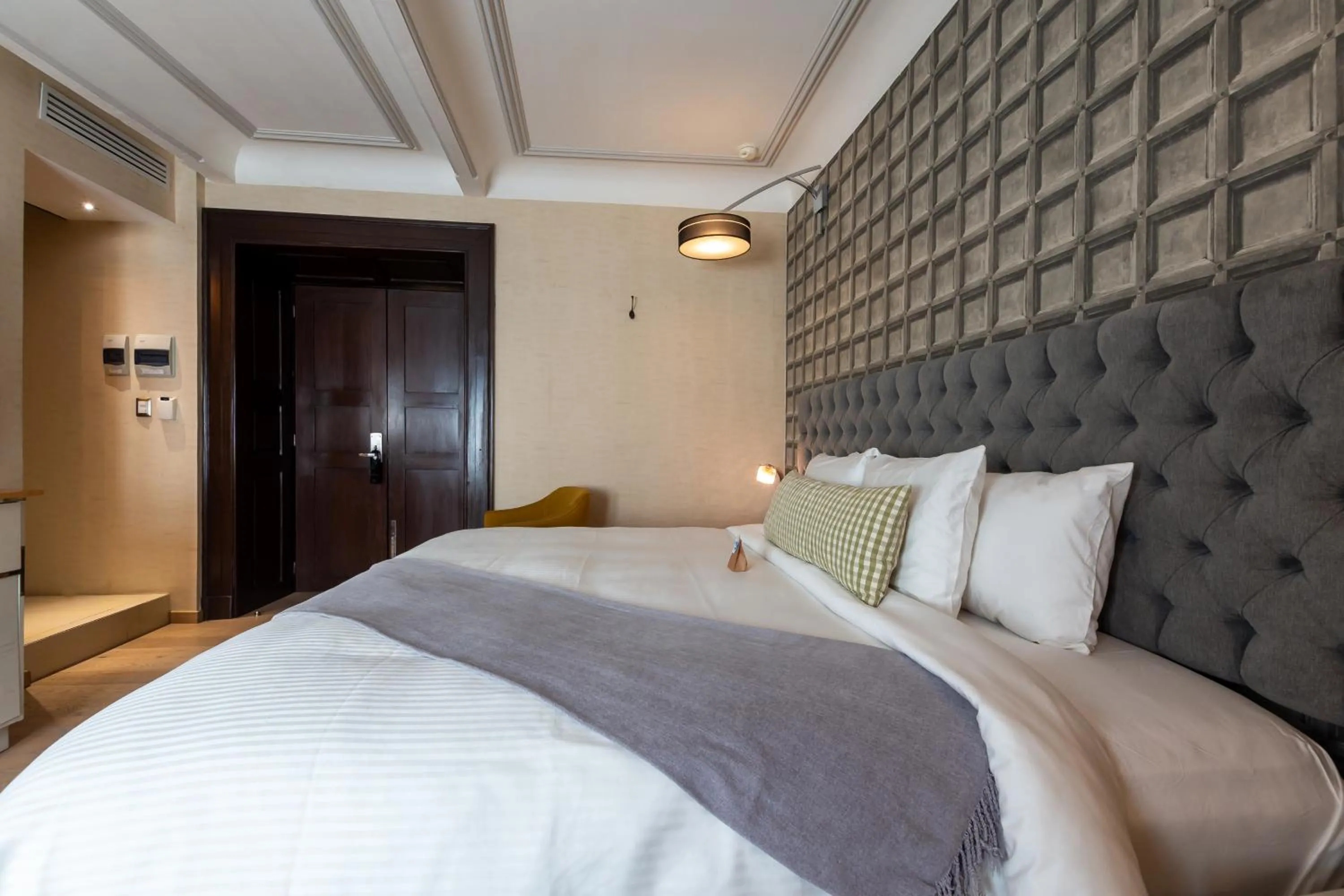 Bed in 1850 Hotel Boutique