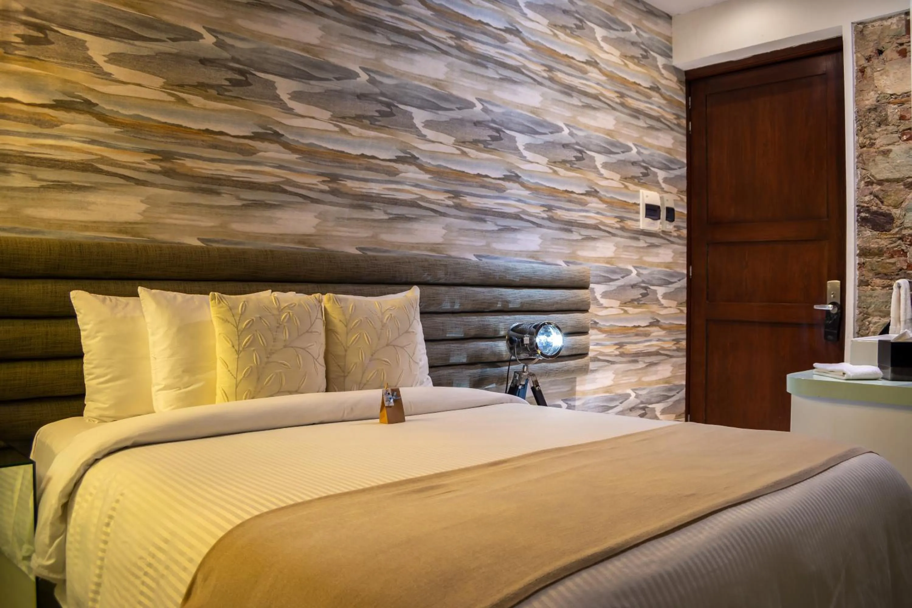 Bed in 1850 Hotel Boutique