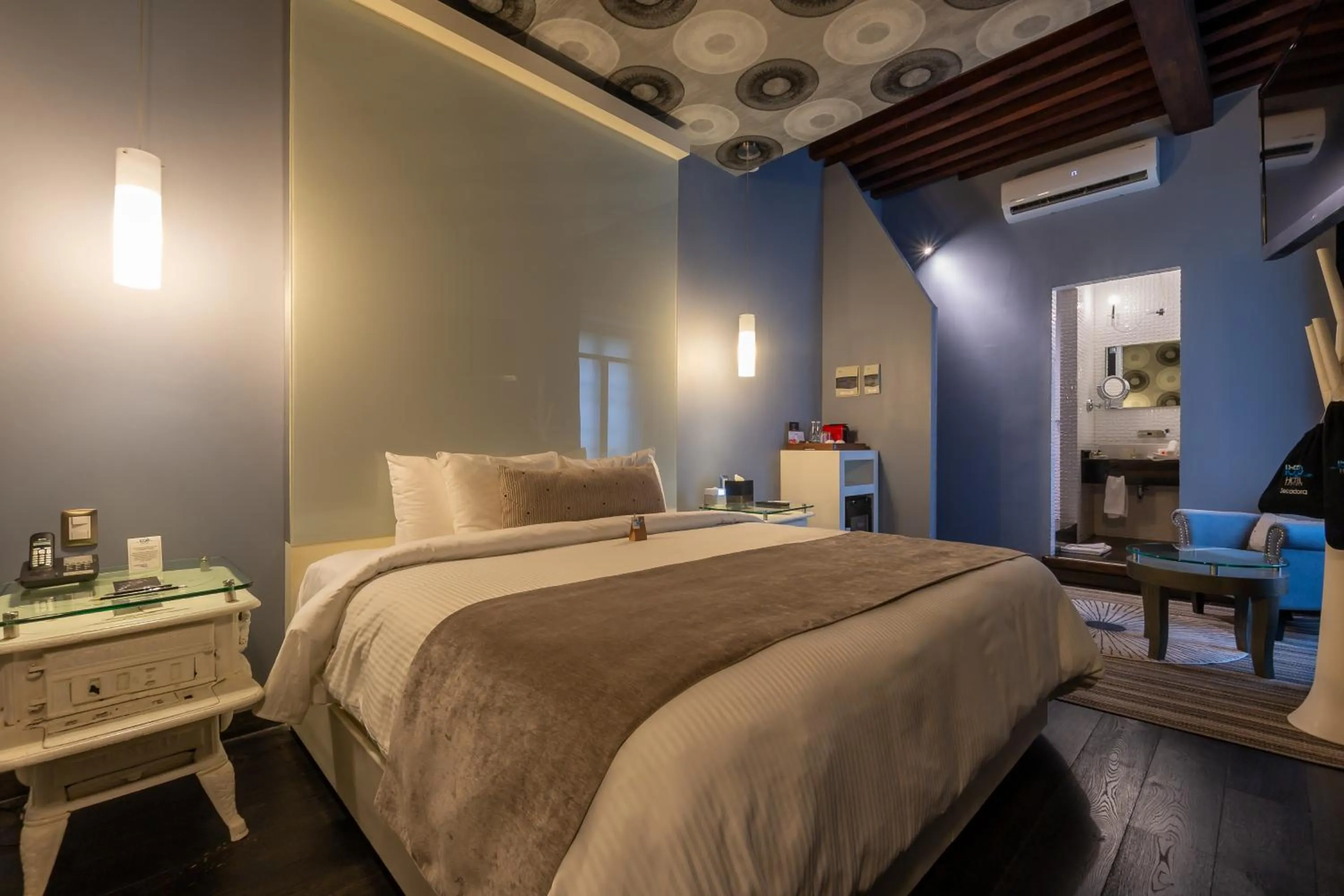 Bed in 1850 Hotel Boutique