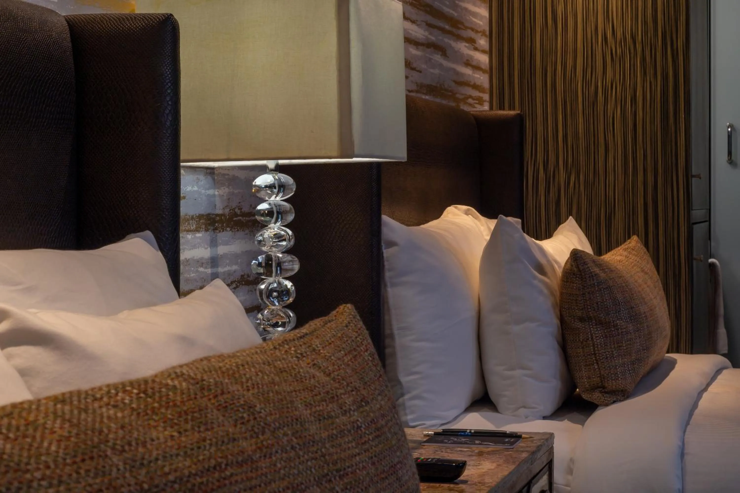 Bed in 1850 Hotel Boutique