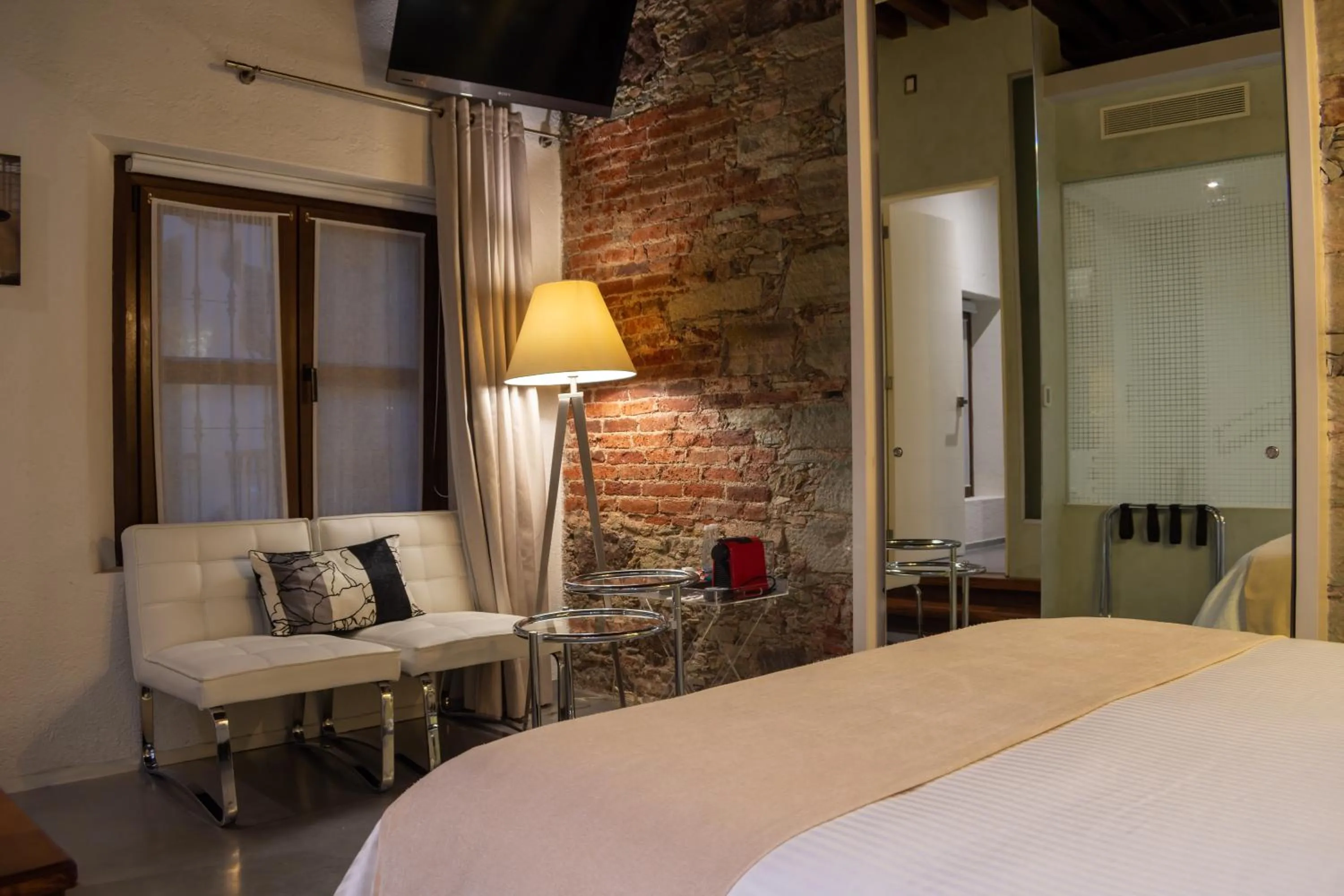 Bed in 1850 Hotel Boutique