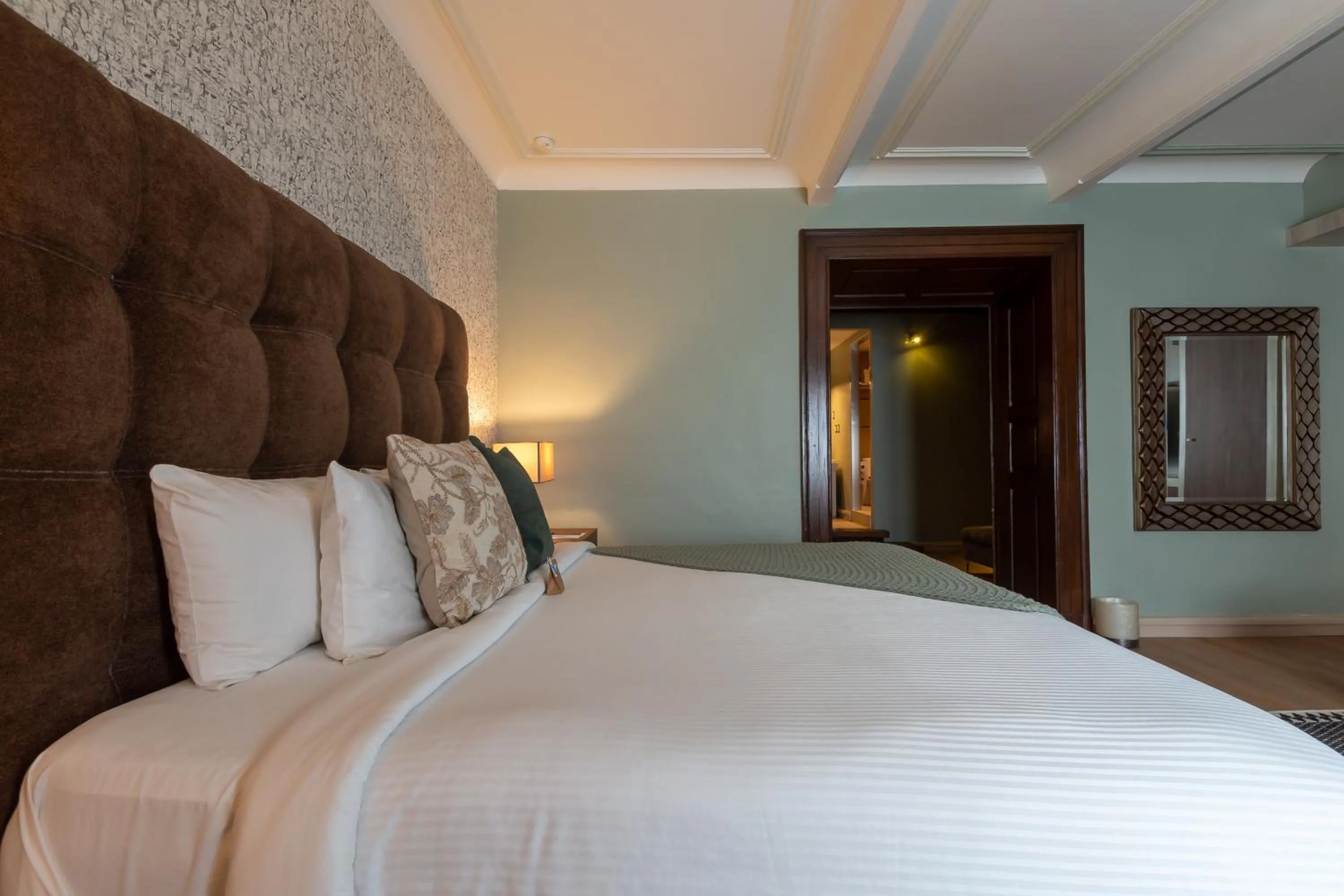 Bed in 1850 Hotel Boutique