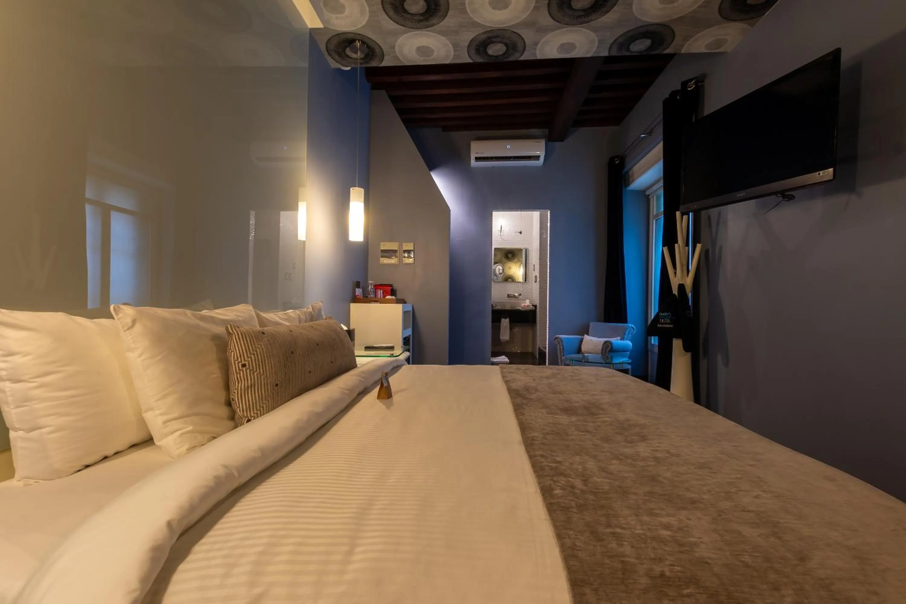 Bed in 1850 Hotel Boutique