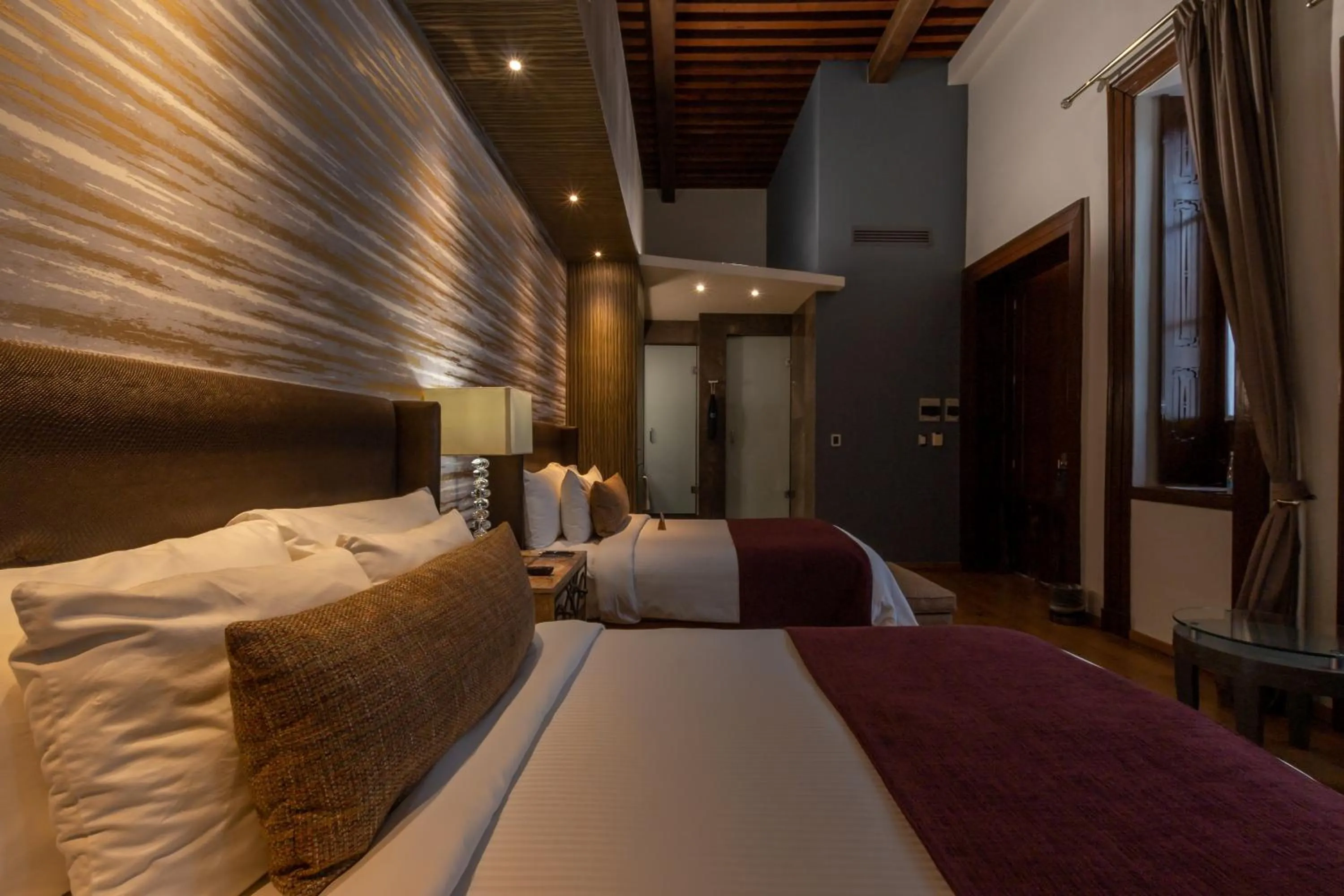 Bed in 1850 Hotel Boutique