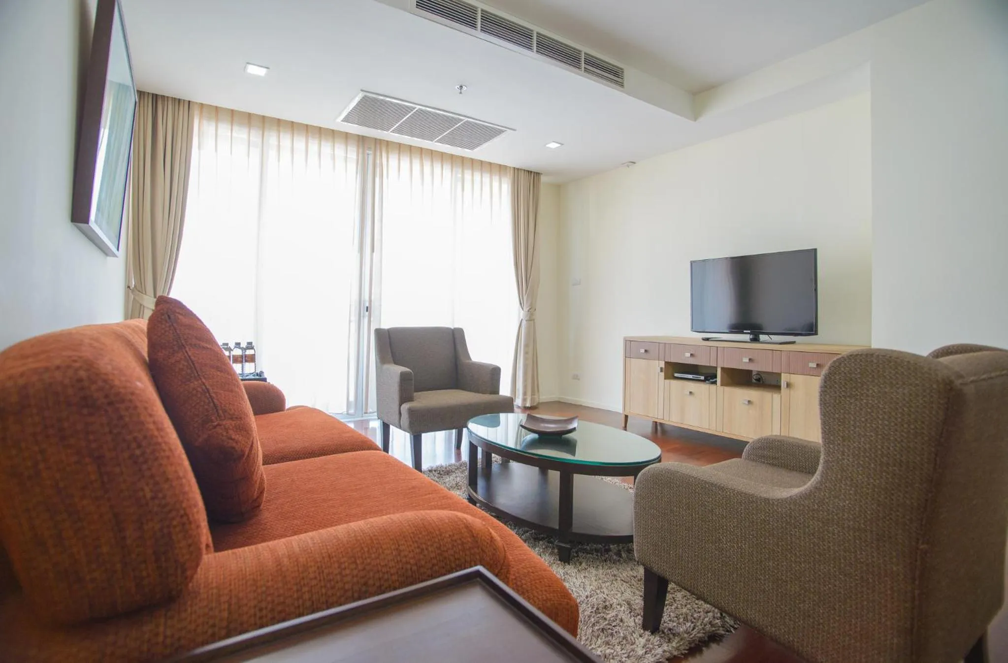 Communal lounge/ TV room in GM Serviced Apartment