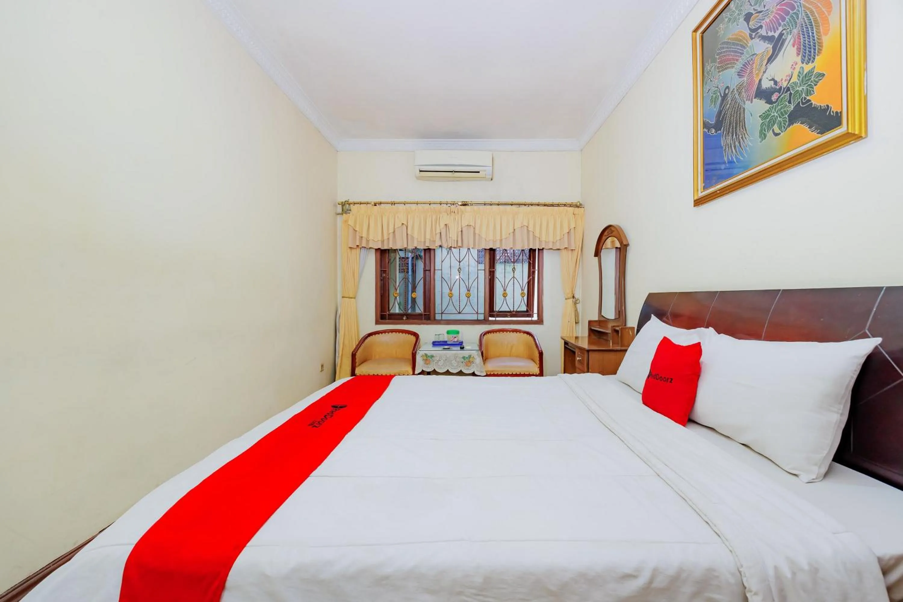 Bedroom, Bed in RedDoorz at Hotel Andalus Puncak