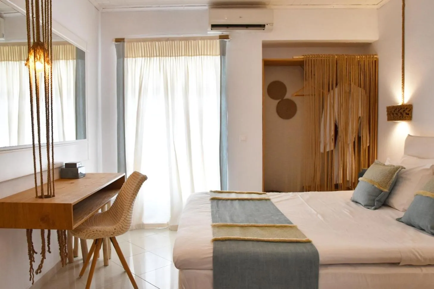 Photo of the whole room, Bed in Angelos Design Suites