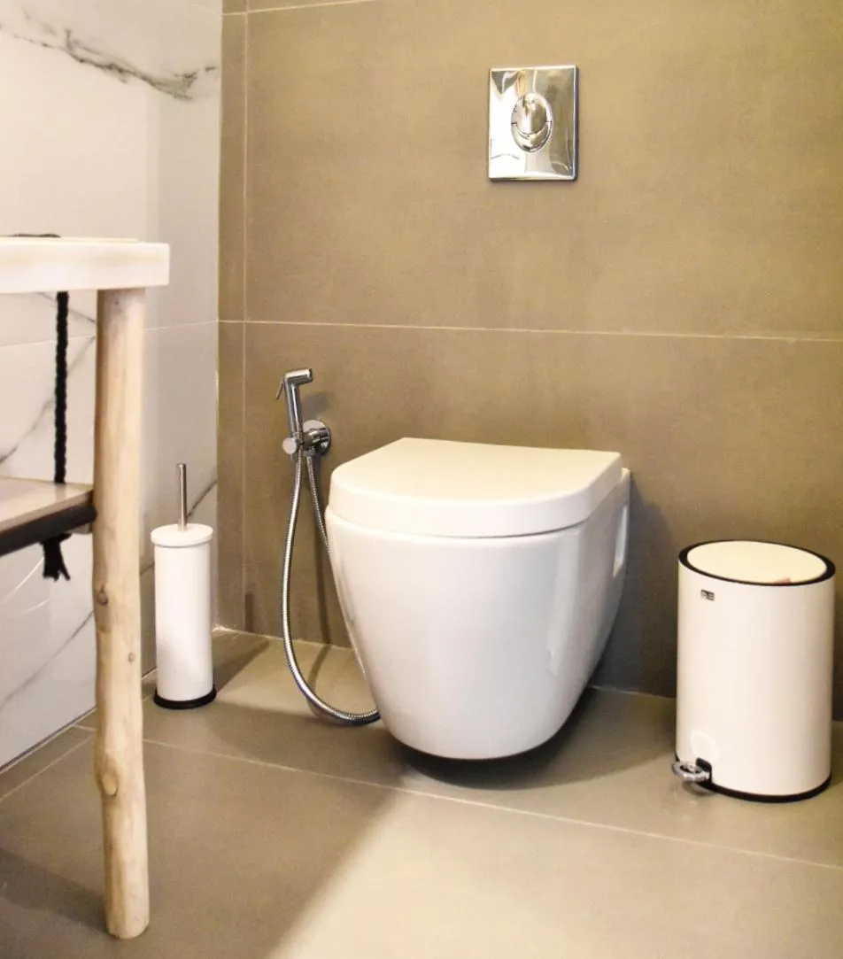 Toilet in Angelos Design Suites